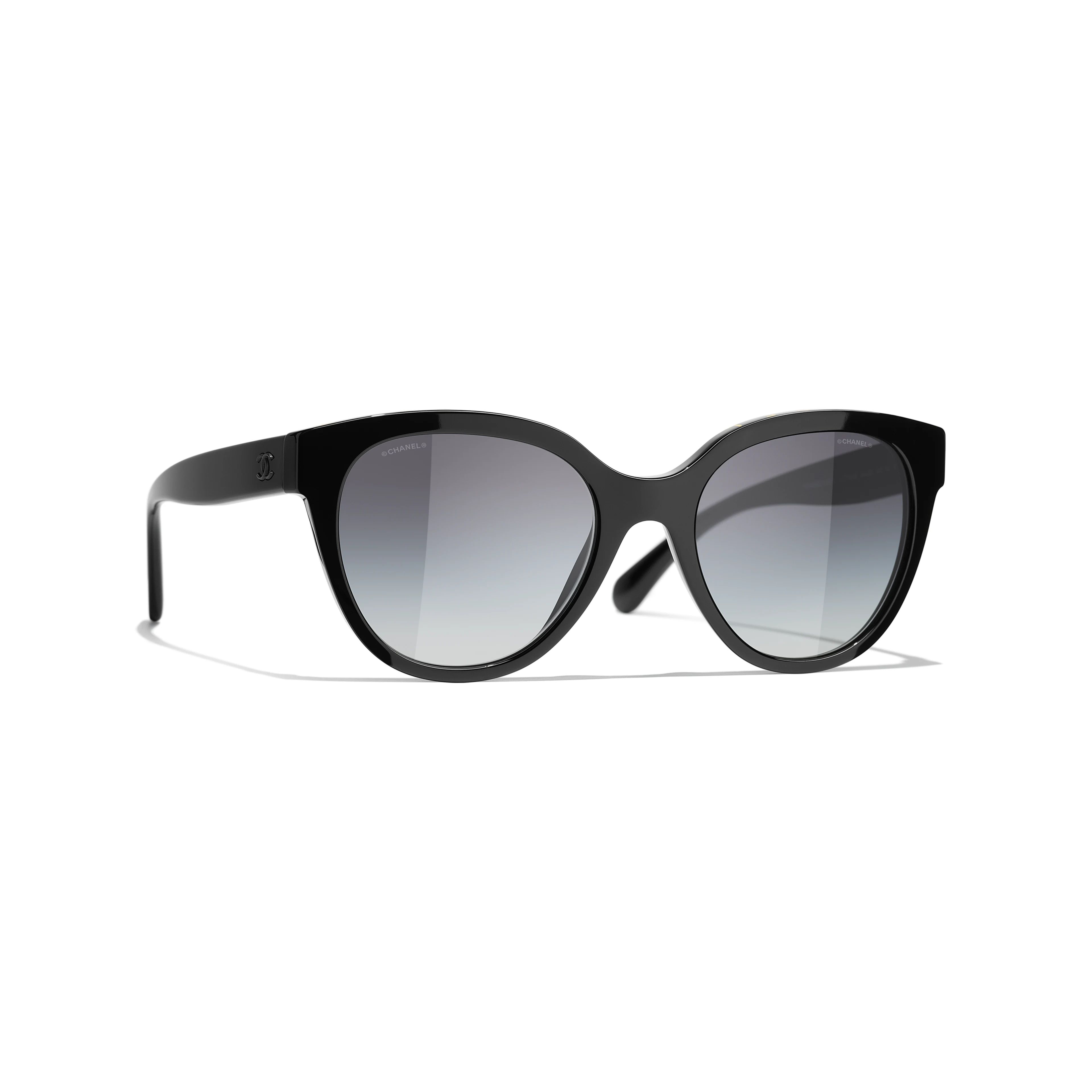 Butterfly Sunglasses

            Acetate
	
		Black & Beige. Lenses: Brown | Chanel, Inc. (US)