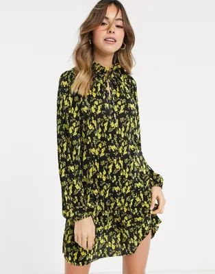 ASOS DESIGN plisse smock mini dress with tie neck in black and yellow floral print | ASOS (Global)
