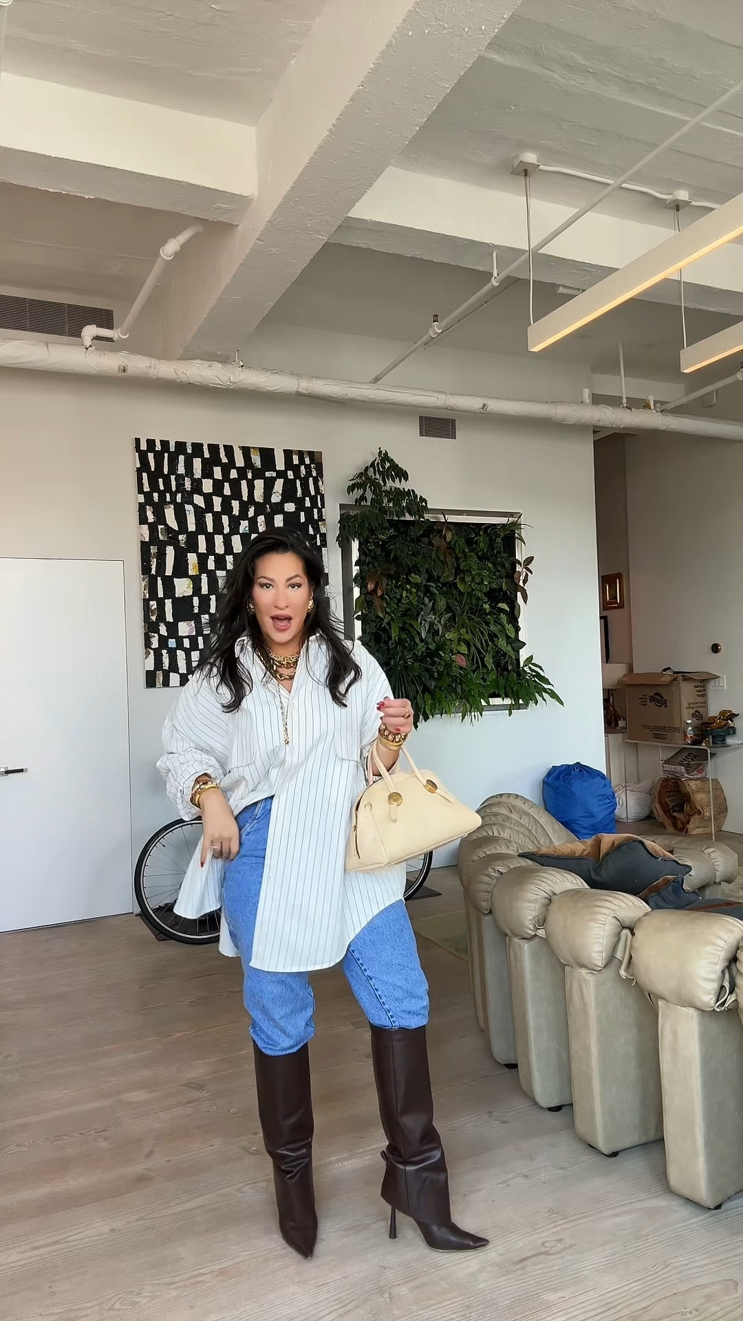 The perfect outfit combo Fall transition outfit in new york city! Oversized white button down, denim and brown leather knee high boots 

#LTKStyleTip #LTKShoeCrush #LTKWorkwear