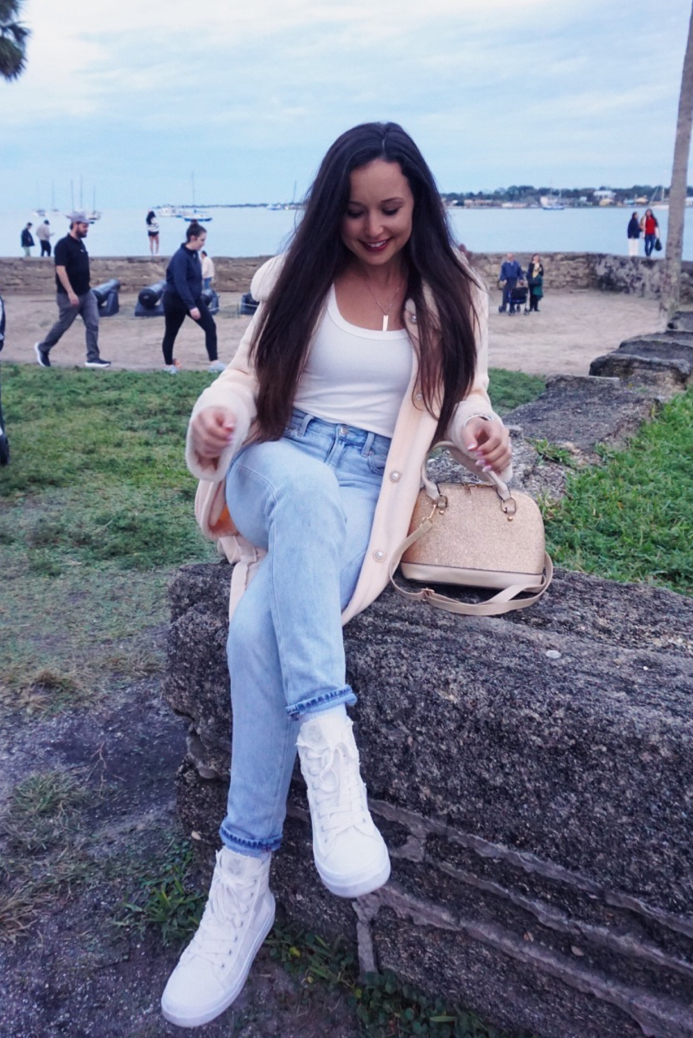 Winter outfit: white tank top, coat, jeans and high tops 

#LTKCyberWeek #LTKSeasonal #LTKHoliday