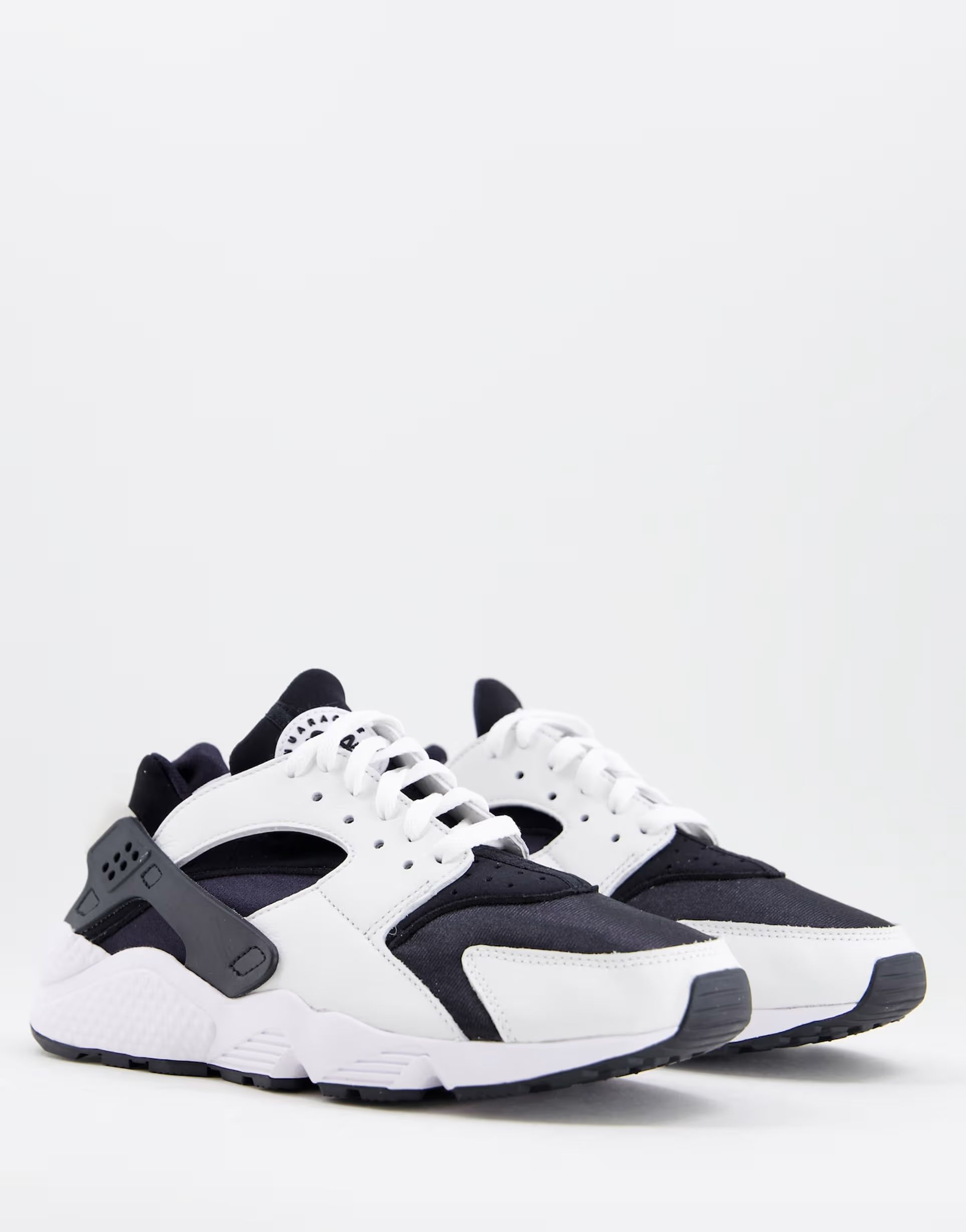 Nike Air Huarache sneakers in black and white | ASOS (Global)