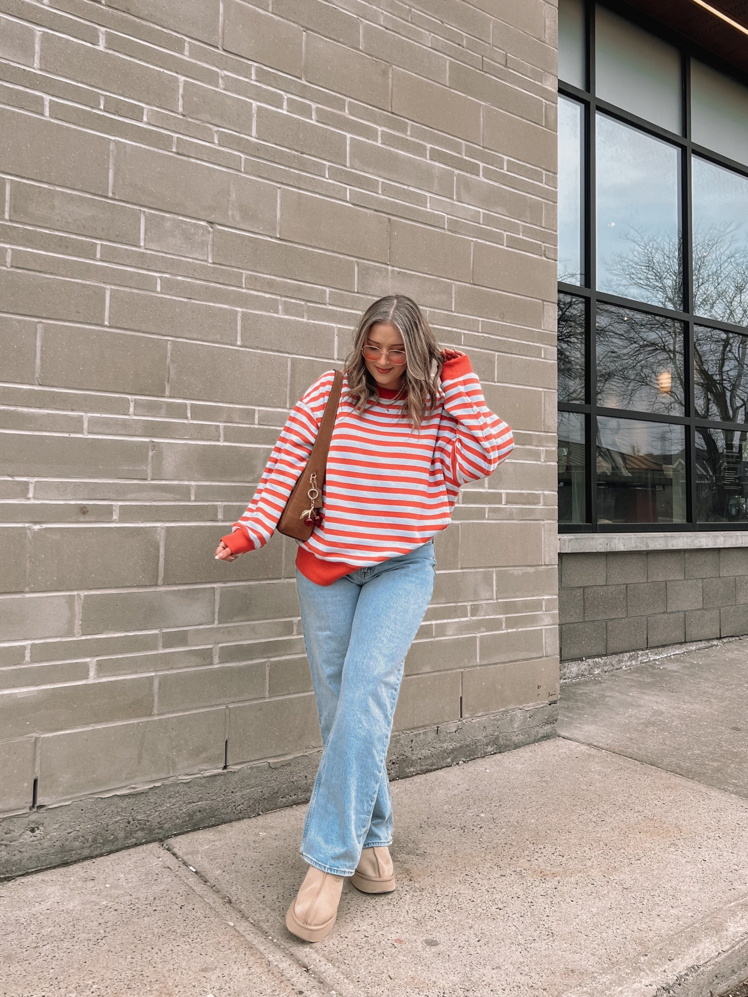 Simple & fun spring outfit! Striped sweatshirt is so cozy and I love the peach & baby blue color combo! Runs big, sized down to M. Wearing my usual 32 in the jeans. I’m a 9.5-10 shoe and wear a 10 in the Ugg tazz platforms


#LTKmidsize #LTKstyletip #LTKjeans