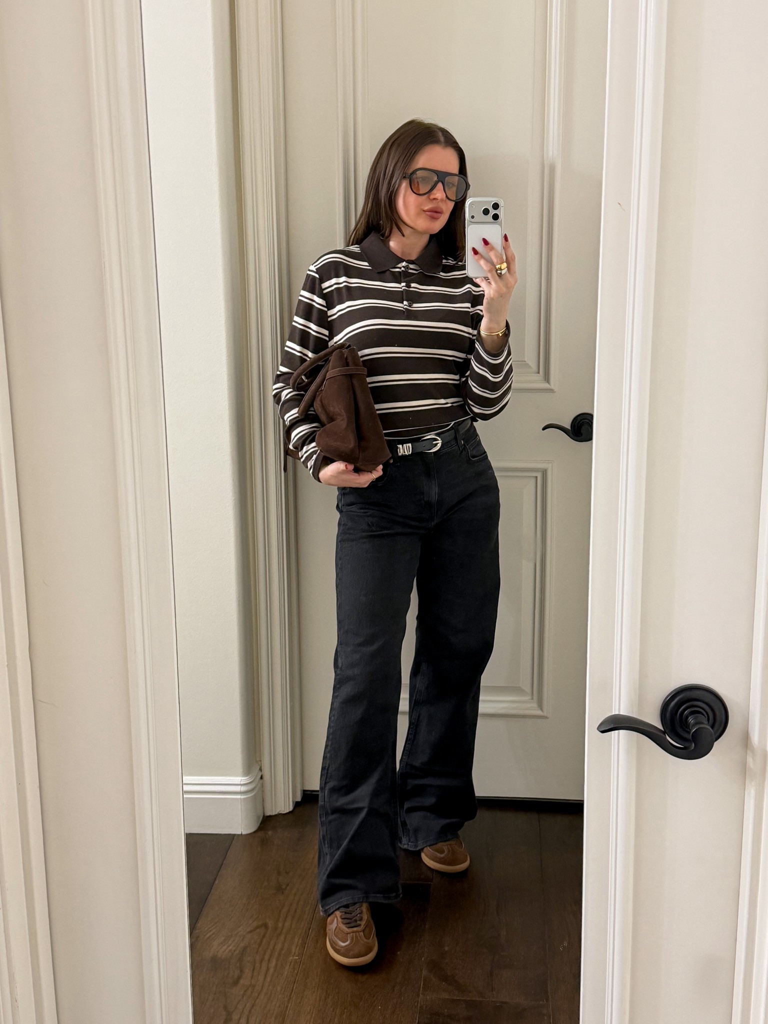 Fall outfit idea. Styling an espresso brown stripes polo shirt with dark denim espresso brown sneakers 
#falloutfit #espressobrown #brown #striped #polo #shirt #sneakers #darkdenim 

#LTKFindsUnder50 #LTKFindsUnder100 #LTKSeasonal