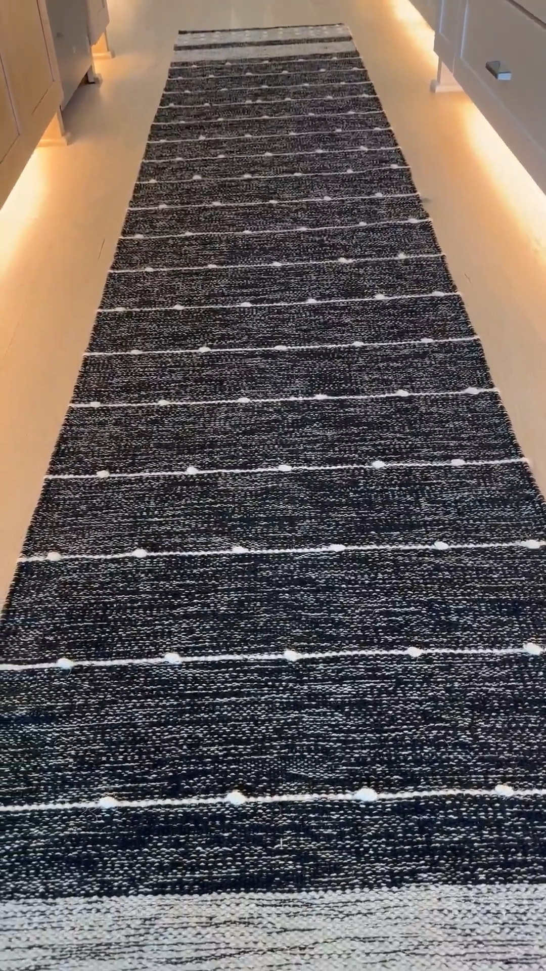 This runner comes in multiple sizes and can be styled under the dining table, bed, or in your great room! ❤️🤍❤️


#LTKStyleTip 
#LTKHome #LTKSaleAlert