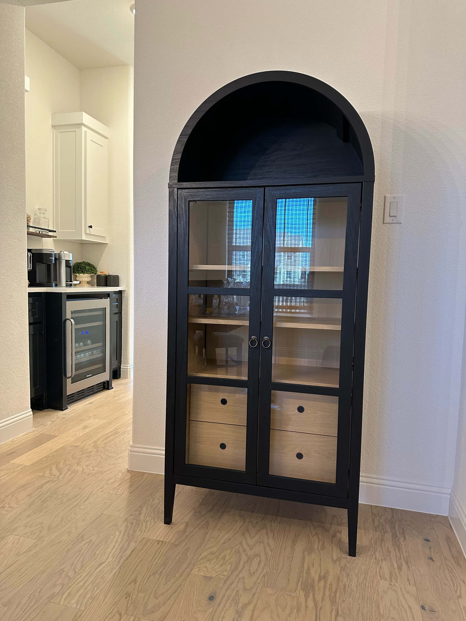 Arched black wood cabinet 

#LTKhome