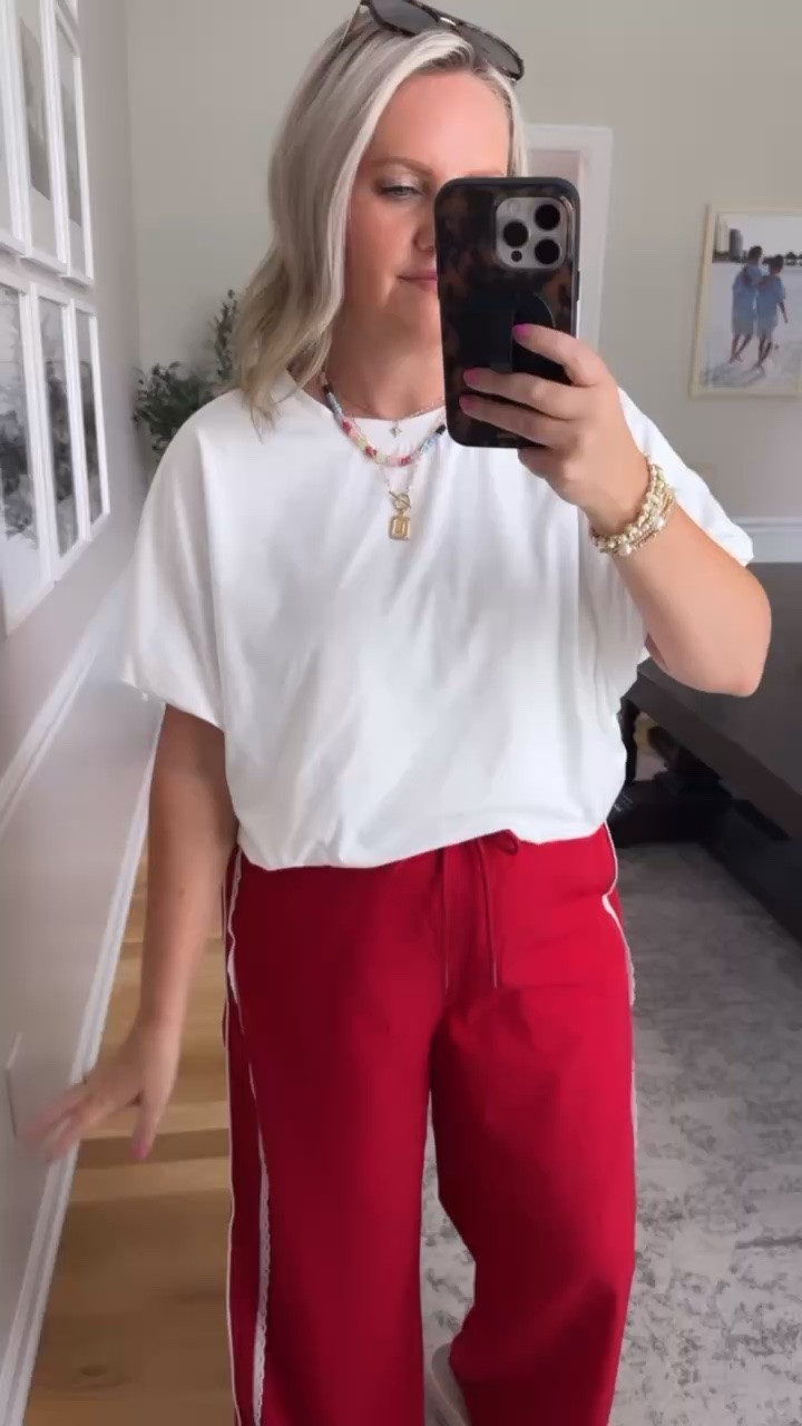 These red track pants are such a fun way to break up all the denim in my closet. I love the sporty shape with a simple tee and sneakers now, then I’ll add a denim jacket when the weather finally cools down.

red track pants, casual outfit, sporty style, athleisure, fall transition outfit, everyday style, sneakers outfit, casual pants, comfortable outfit, lovelylifestyling

#LTKootd #LTKActive #LTKTravel