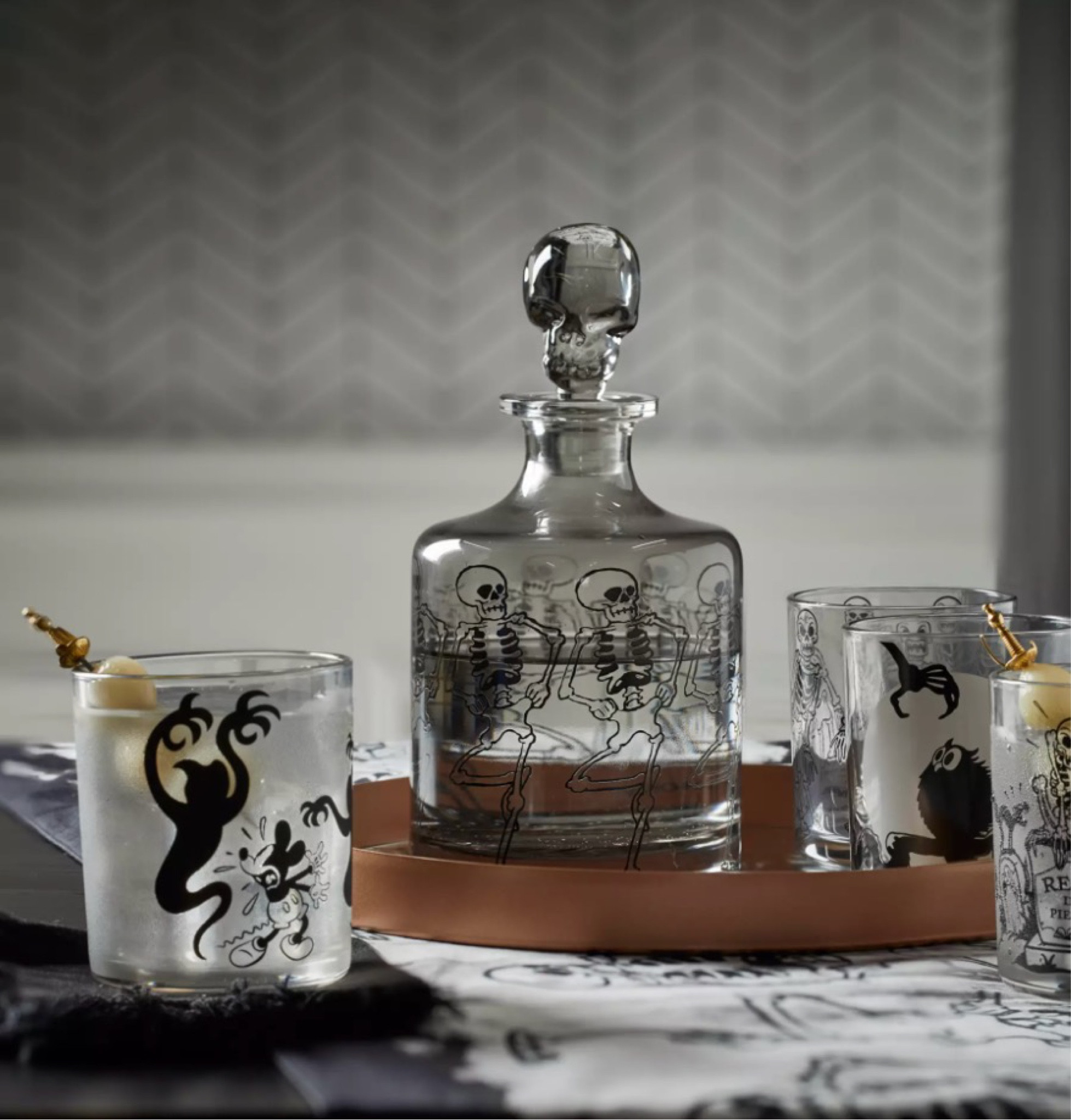 Calling all Disney nostalgists! The iconic "Skeleton Dance" collection has returned with a bang! Relive the classic Disney short with a range of bewitching offerings, perfect for your Halloween-themed home decor. From hauntingly adorable throw pillows featuring Mickey and Minnie in their skeleton outfits to eerie wall art that captures the spirit of the original animation, these items are sure to add a touch of vintage Disney charm to your abode.