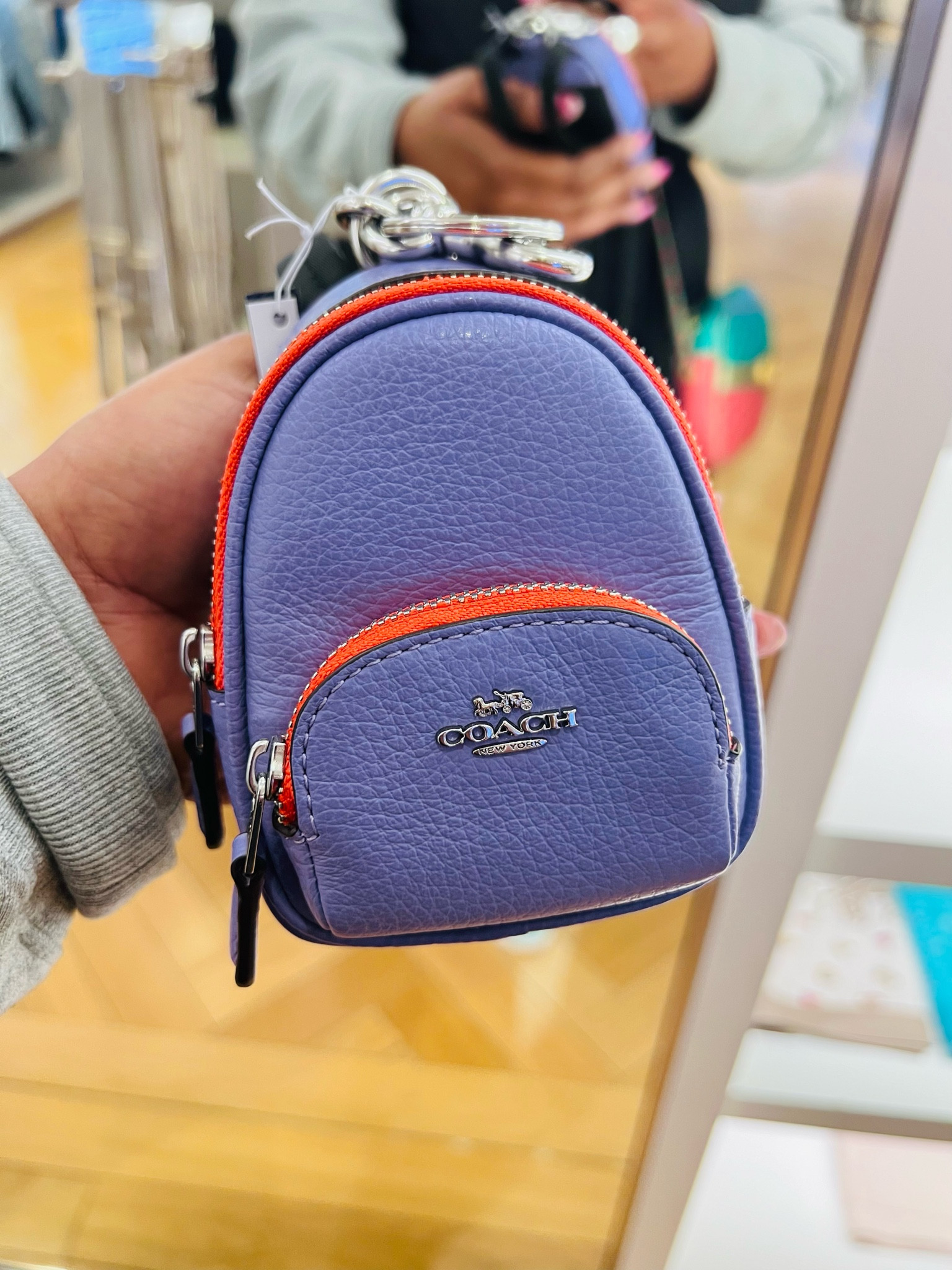 coach backpack coin purse Mini Court Bag Charm Keychain Brown Signature Canvas CX  Luxe Fashion Finds Signature coated canvas and smooth leather Zip closure fabric lining Outside zip pocket Attached split key ring and dogleash clip 3 1/4 (L) x 4 (H) x 1 1/2 (W) Style No. coach's SS25 collection is a