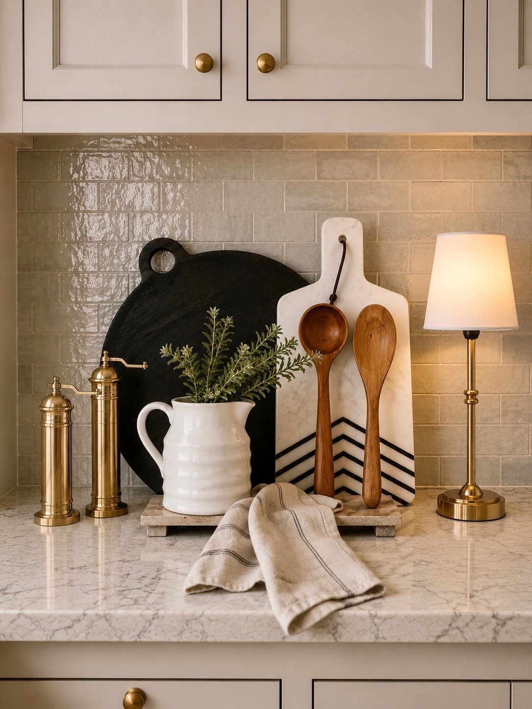 Kitchen Finds from Pepper & Vetiver ✨

Follow @farmtotablecreations on Instagram for more simple, elevated home finds.

These beautiful kitchen styling pieces  instantly gave this countertop that warm, collected look I love. The oversized black cutting board, marble chevron board, brass mills, cozy lamp, and soft linen towel all layer together so effortlessly while still feeling functional and timeless. And I absolutely love the freestanding spoons.

Such pretty pieces for adding warmth, texture, and a designer-inspired touch to your kitchen styling.

#kitchendecor #countertopdecor #neutraldecor #kitchenstyling #homedecor

#LTKHome #LTKSaleAlert