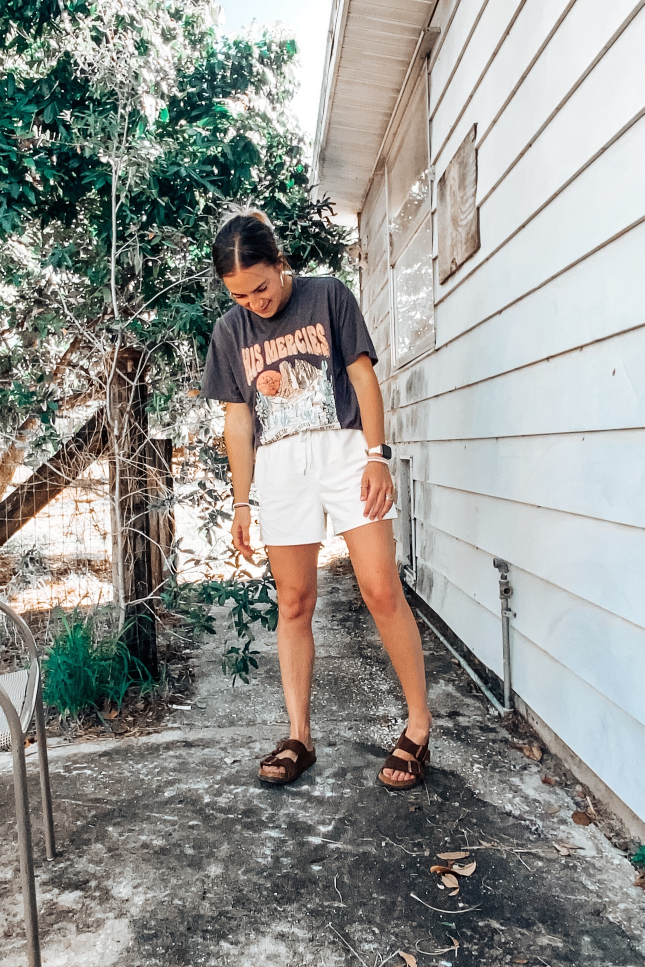 Athliesure 
athletic shorts outfit 
White shorts 
Graphic tee 
Graphic tee outfit 
Casual outfit 
Errands outfit 
School pickup outfit 
Sandals 

#LTKstyletip