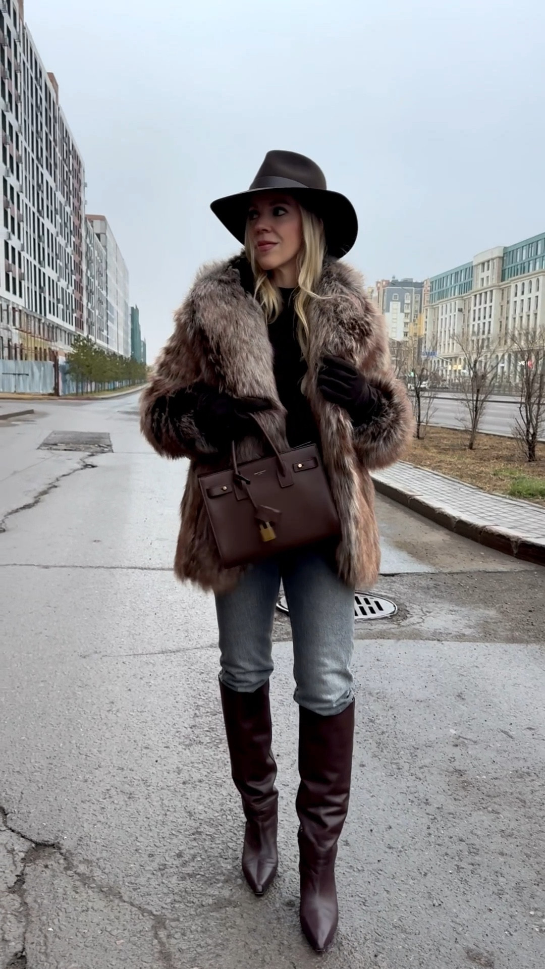 Faux fox fur coat, Janessa Leone dark brown wool hat (on sale now!), Levi’s gray jeans, dark brown suede gloves, dark brown western boots 

#LTKOver40 #LTKSaleAlert #LTKSeasonal