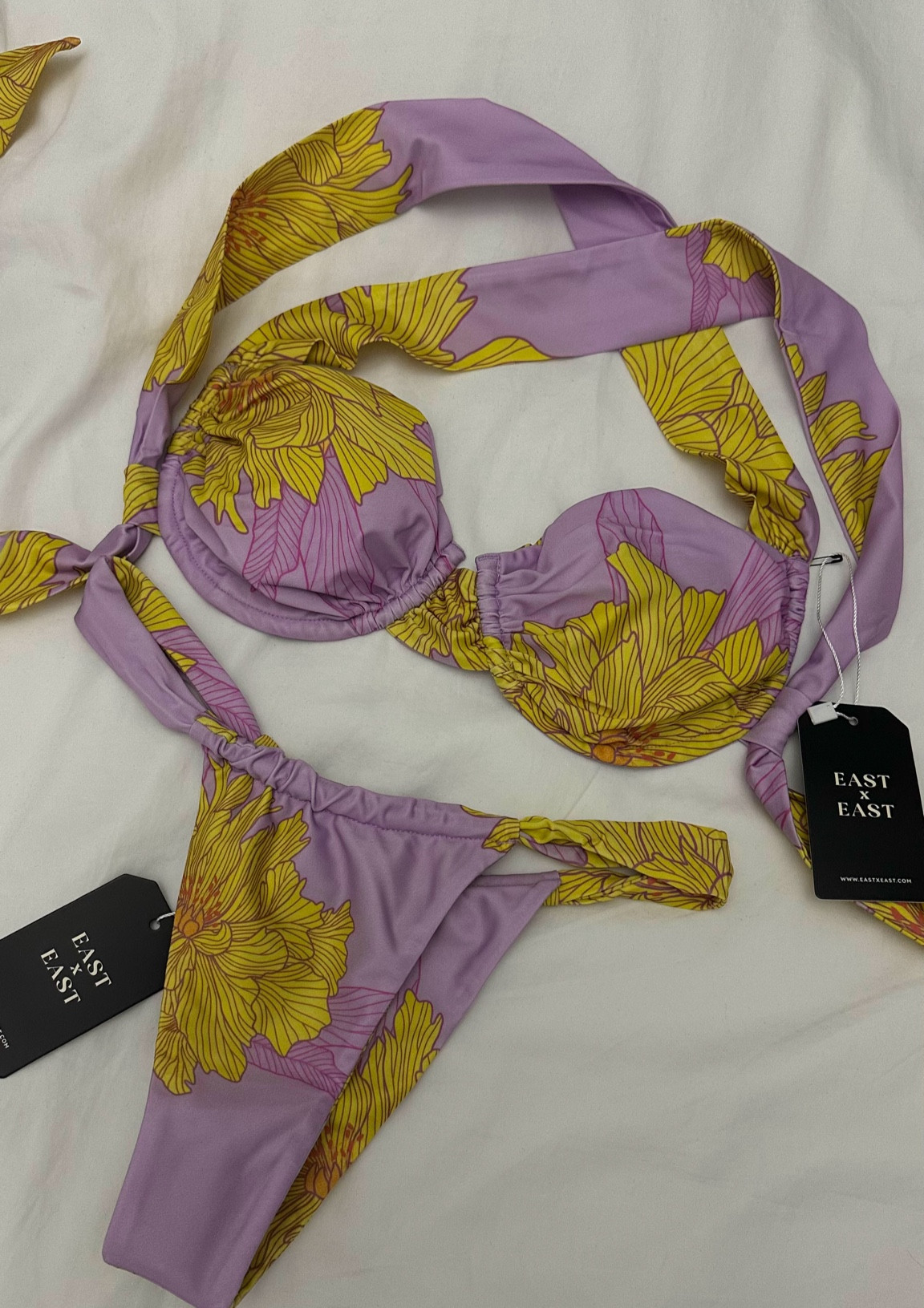 Swimsuit from East x East 💜💛 this print and the colors are so fun for the summer👙

#LTKStyleTip #LTKTravel #LTKSwim