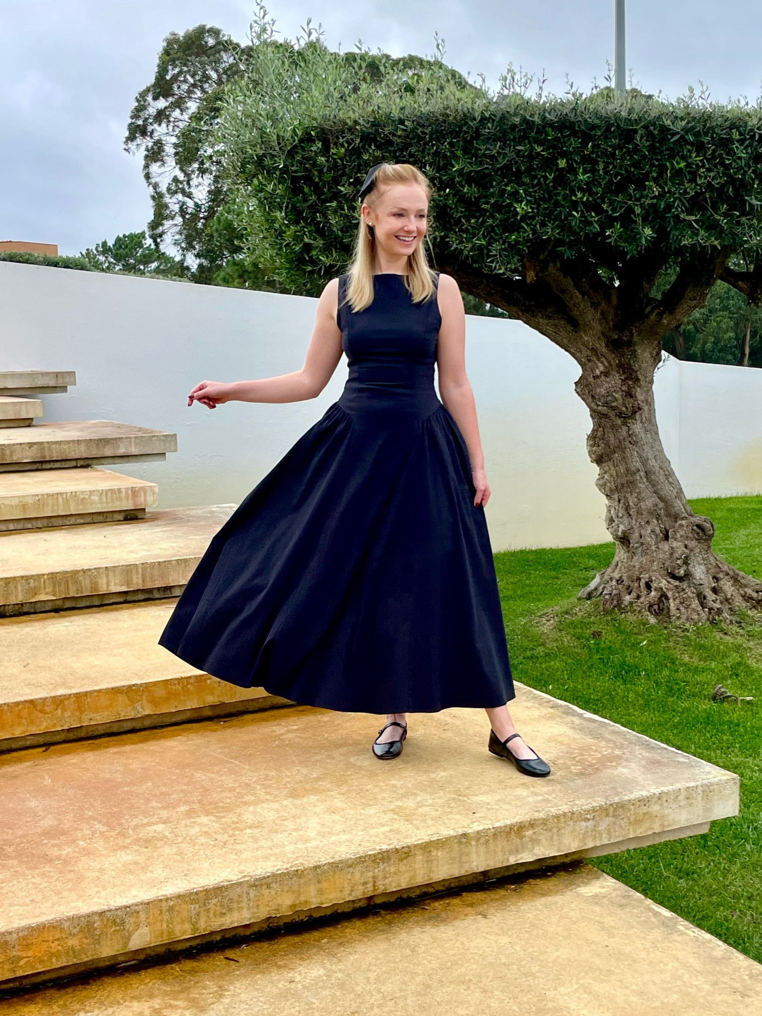 OOTD in Portugal! Wearing XS regular in the dress, linked similar options! | drop waist dress, black dress, hair bow, Mary janes 

#LTKStyleTip #LTKSeasonal #LTKTravel