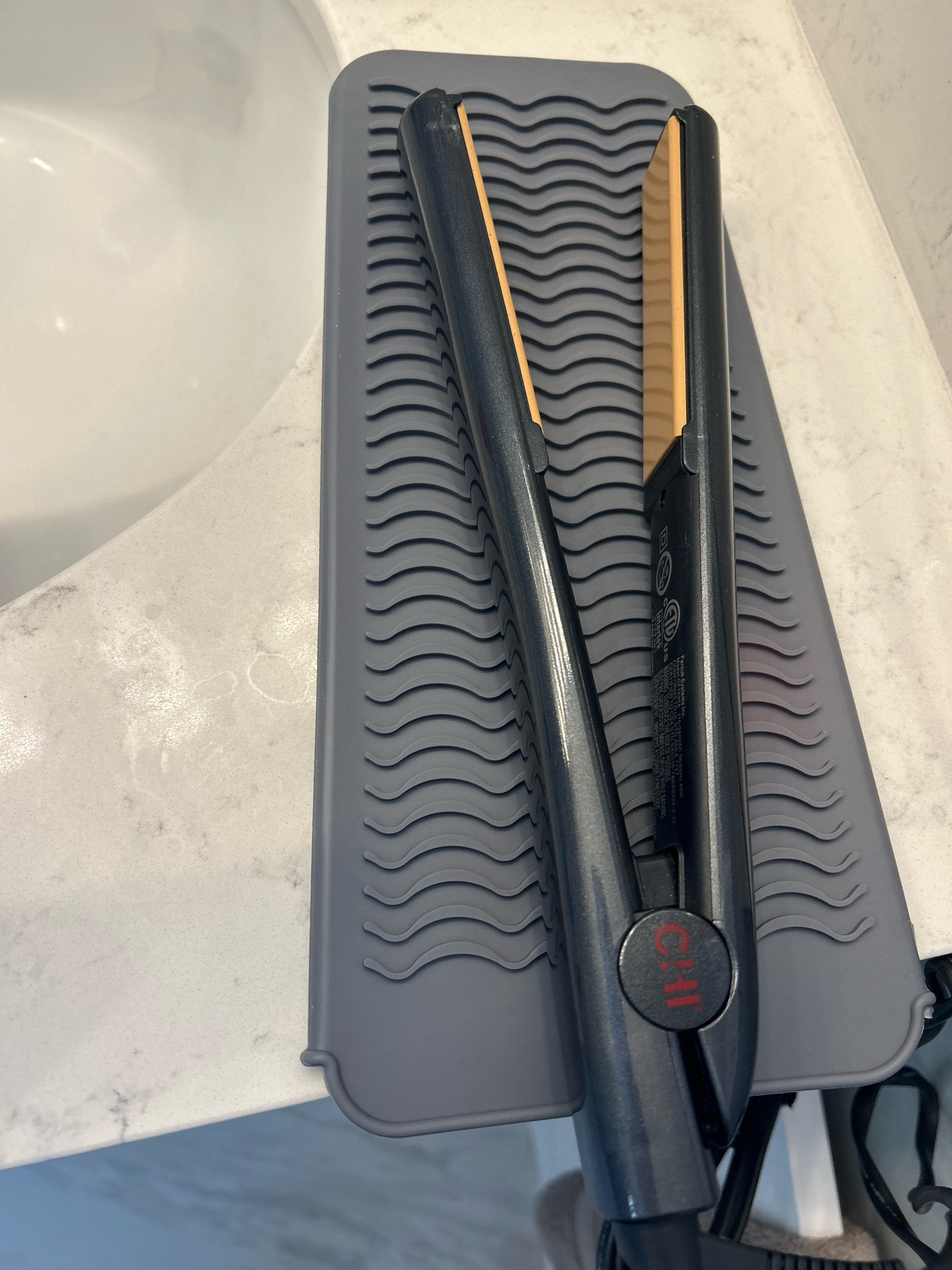 Fantastic silicone mat and storage case for hot tools. Great for protecting your counters and a good spot to put your hot tools while they’re still hot. I just stick my straightener inside the case when I’m done and it has not melted! Under $6!

#LTKbeauty #LTKhome