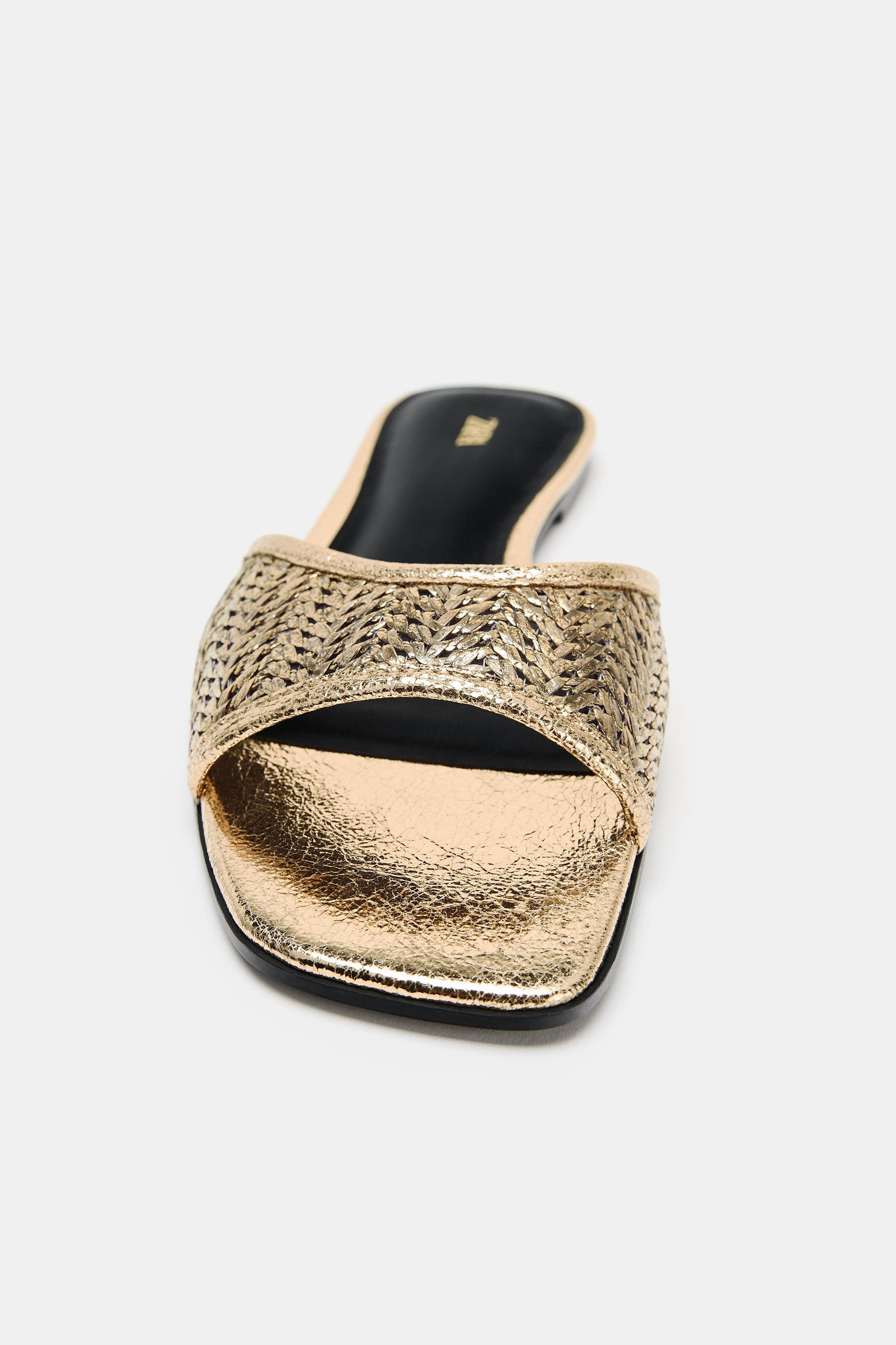Metallic-effect flat sandals. Slide style. Front strap with braided effect. Square toe.Sole heigh... | Zara UK