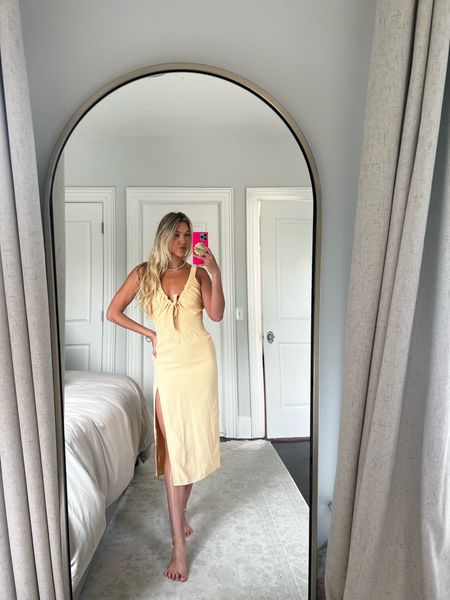 Love this yellow midi dress with a slit from Abercrombie! Great option for a wedding guest dress. Yellow is sold out, but still available in black and a brown patterned version!

#LTKunder100 #LTKwedding #LTKstyletip
