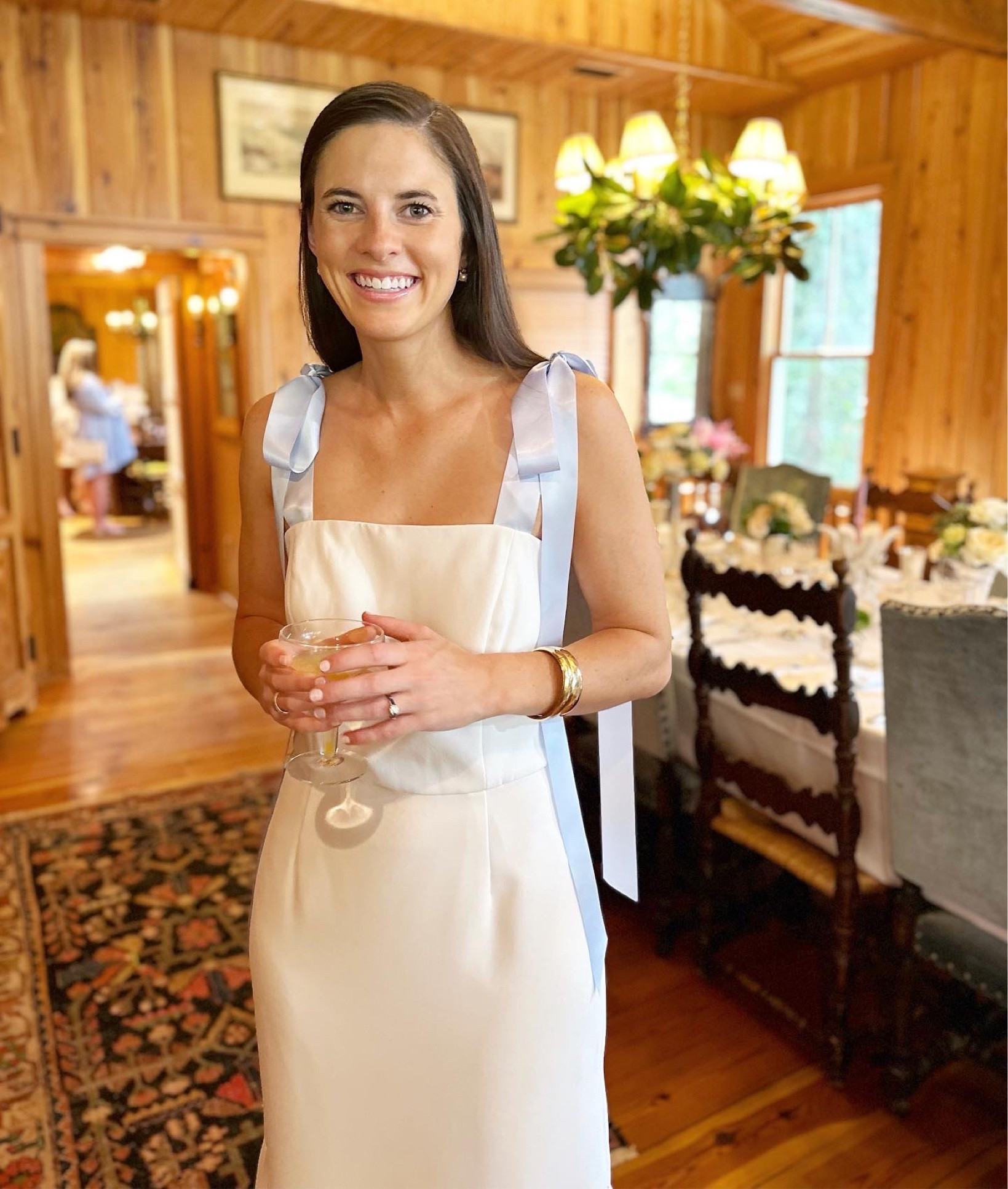 Finally getting around to sharing photos from our end of October Wedding Weekend! We started the festivities with the most beautiful bridesmaid’s luncheon with family and bridesmaids thanks to such gracious hostesses. Fun fact, the house where this was hosted is the same house where Hunter & I got engaged adding to all the fun memories here with friends that feel more like family! 

I really struggled with what I wanted to wear for this and landed on the most perfect white dress with blue bows by @janesummersnewyork! They offer a variety of silhouettes that fit a number of bridal occasions and this style (James Strapless White Tea Length Mermaid Style with Light Blue Ribbons) was exactly what I had hoped for. I even decided to put on my wedding shoes a day early thanks to how perfectly they matched the ties!

Rehearsal dinner dress, bridesmaids luncheon dress, white dresses, bridal attire, blue bow dress, bridesmaids luncheon, bridal luncheon, wedding shower dress, wedding heels, loeffler Randall bow heels, bride, white midi dress, jane summers, fall bride 

#LTKwedding