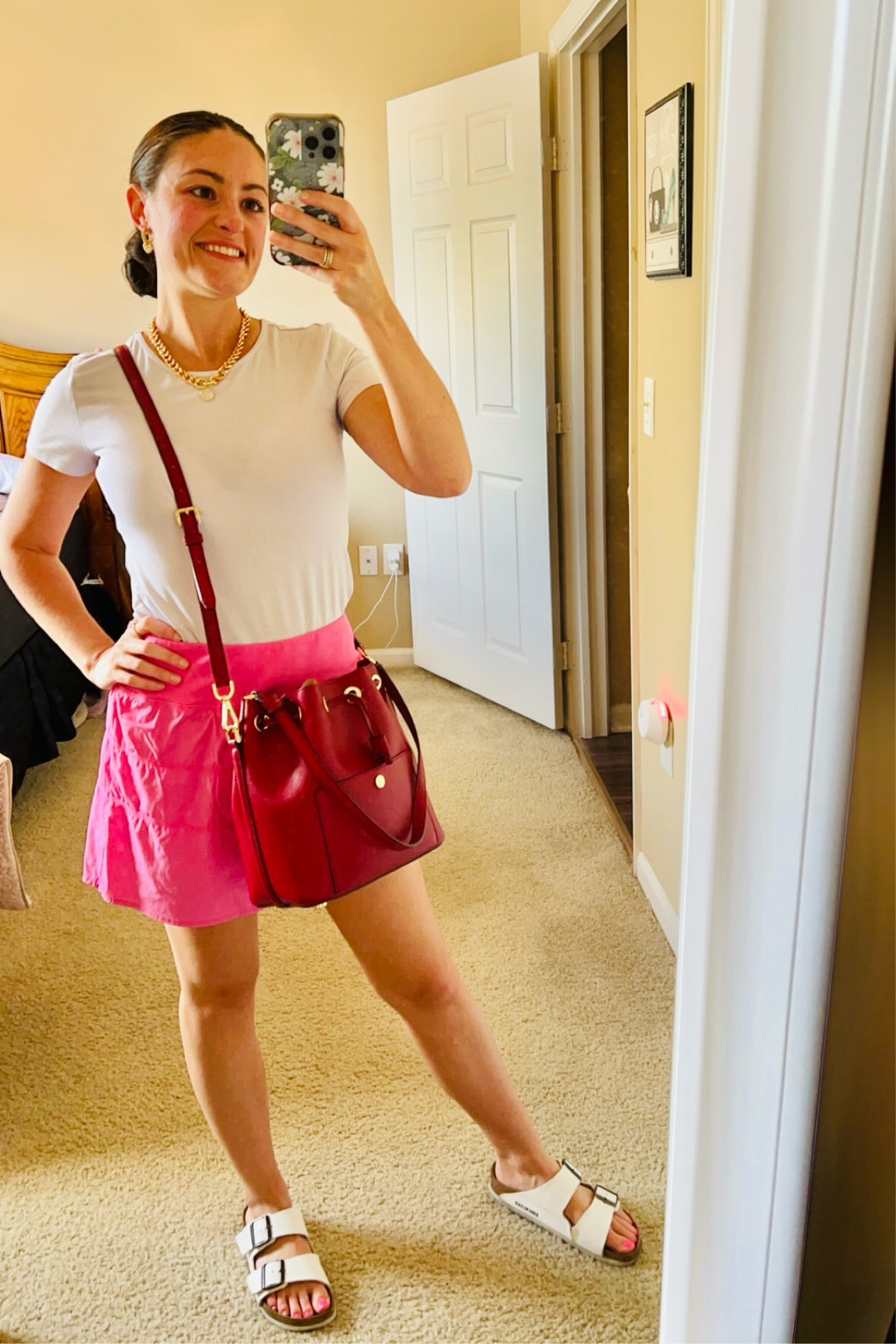 Off duty girly casual vibes  💕 h&m white tee pink lily skort w pockets MK red leather bucket bag (similar linked) birkenstocks sandals ettika jewelry 

#LTKFindsUnder100 #LTKSeasonal #LTKActive