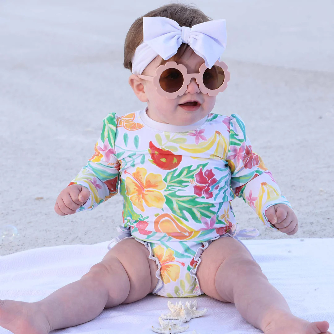 Long Sleeve Rash Guard With Ruffle Bottom | Tropical Paradise | Caden Lane