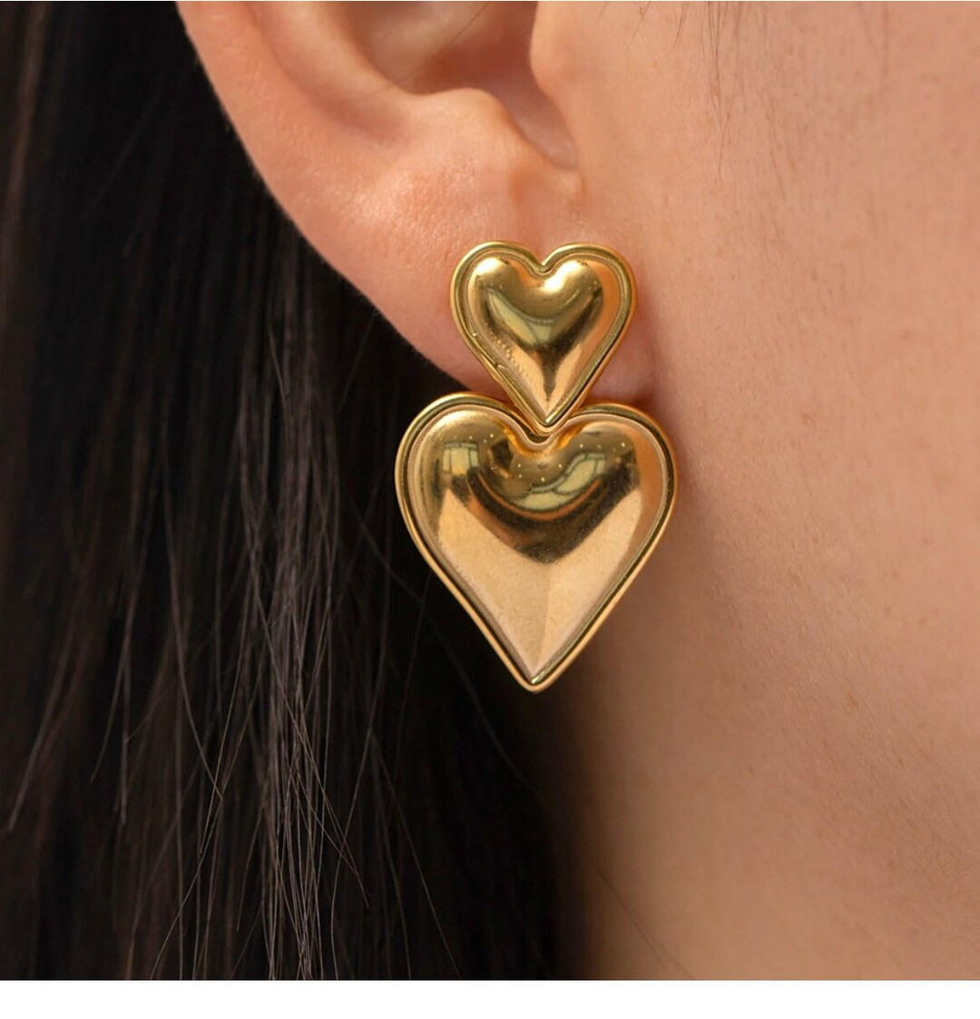 Double hearts dangle earrings gold or silver | Etsy (US)