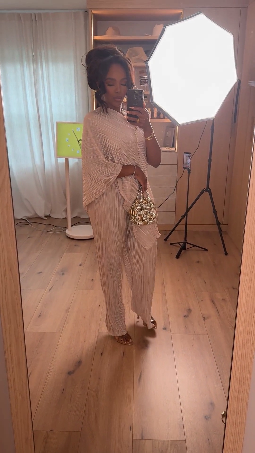 This neutral set looks SO expensive 🤎

The pleated texture, draped silhouette, and monochrome neutral tone give effortless luxury energy without even trying. Paired with statement accessories and soft glam, this instantly feels like a high-end resort look you’d see on vacation in Europe.

Perfect for vacation dinners, brunch, bridal events, upscale dinners, resort nights, or elegant summer events.

Affordable elevated pieces styled with luxe-inspired accessories always create that rich, polished vibe. I love outfits like this because every piece can be styled separately too, making the cost per wear so worth it long term.

5’4 | 140LBS | 34D-27-40 | size small or 4

Neutral outfit ideas, pleated set outfit, elegant vacation style, luxury inspired fashion, classy neutral outfits, resort wear women, chic monochrome look, elevated matching set, feminine elegant style, vacation dinner outfit, sophisticated summer fashion, effortless luxe outfits, classy brunch outfit

Follow me on Instagram and YouTube @kirasfashionfinds