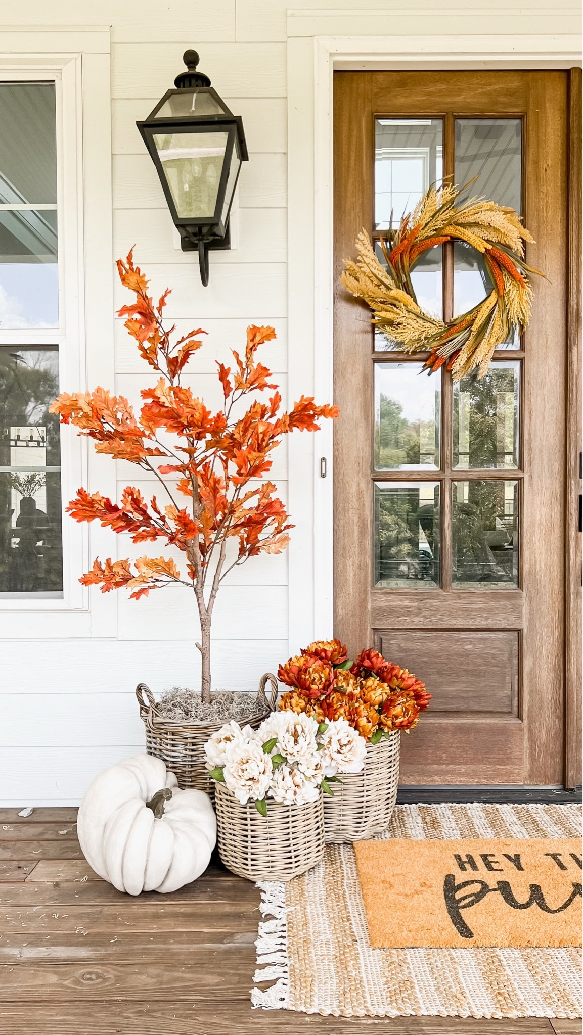 fall porch decorating idea for 2026! This was my front doors decorated for fall three years ago in all the orange tones!

#LTKSaleAlert #LTKHome #LTKSeasonal