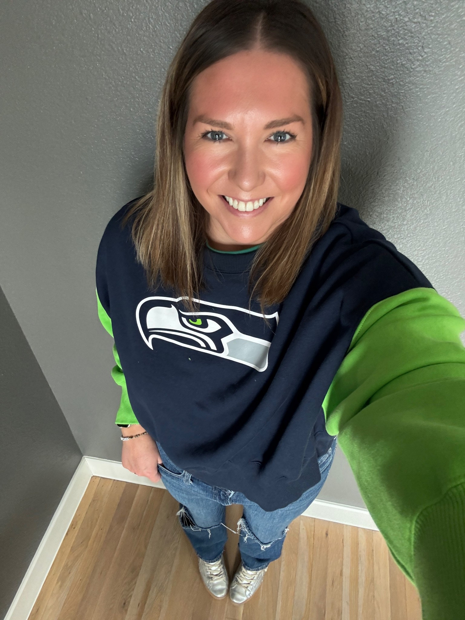 Super Bowl Sunday 🏈🏈🏈 Go Seahawks! It was time for a little upgraded gear this season. I love this Nike sweatshirt with the two tone colors. I had to switch into shorts now but jeans were needed this morning. Let’s go Seattle! 

#LTKMidsize #LTKActive #LTKootd