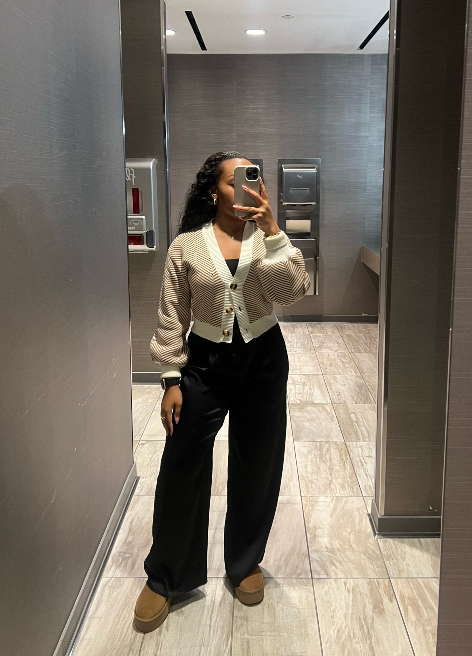 Workwear Wednesday 🫶🏾 1st day back in the office of 2025.

Striped knitted cardigan with balloon sleeves, high waisted satin black trouser pants, classic mini suede platform uggs

#LTKStyleTip #LTKFindsUnder100 #LTKWorkwear