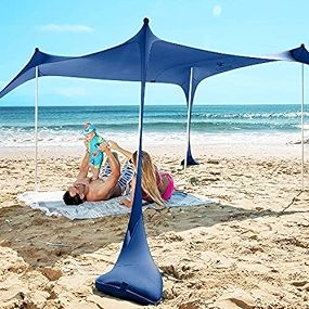 SUN NINJA Beach Tent, UPF50+ Beach Shade Canopy, Pop Up Sun Shelter with Sand Shovel, Ground Pegs an | Amazon (US)