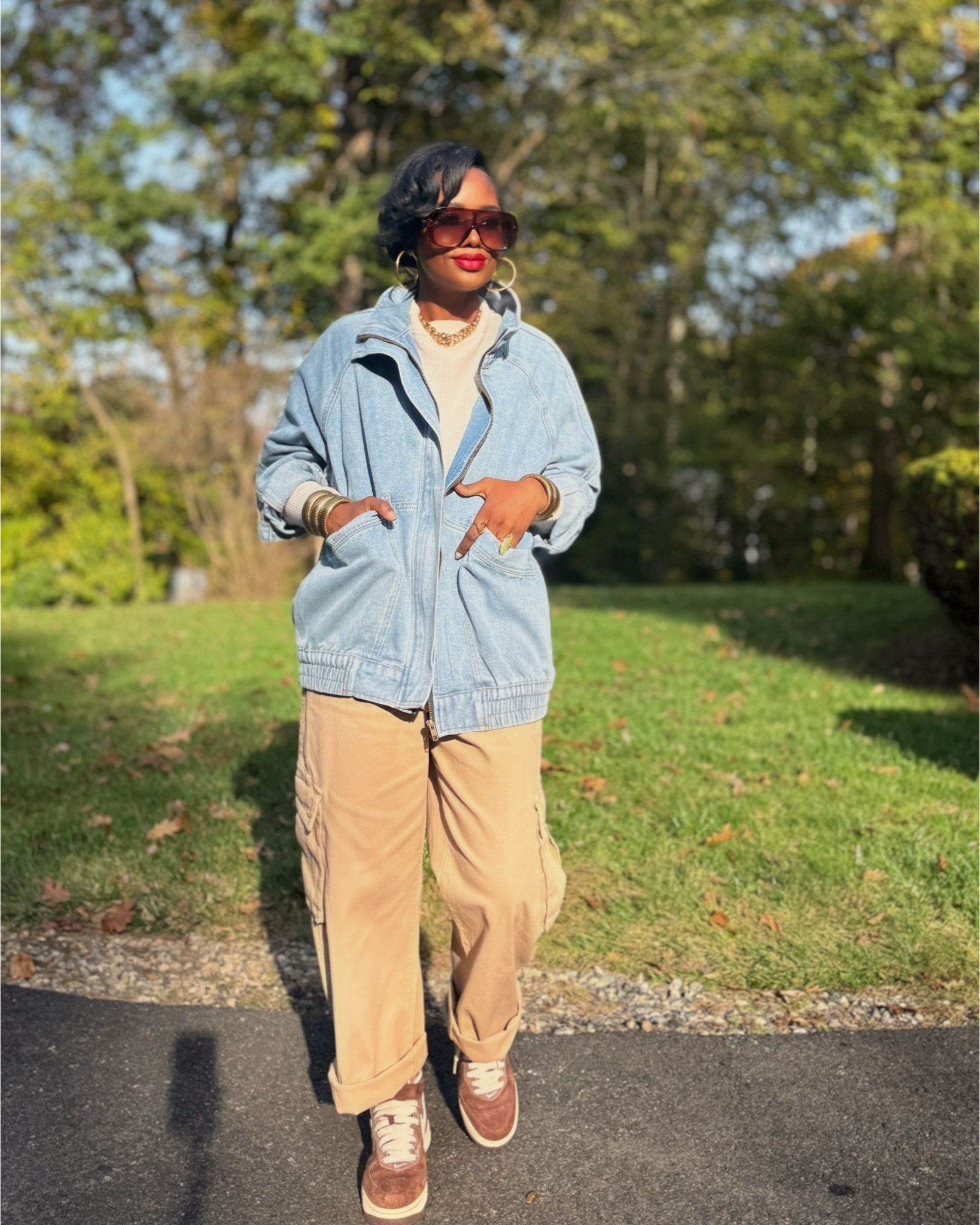 This is what I call casual-cool done right…a light denim zip-up, soft cargo pants, and sneakers that feel just the right amount of vintage. It’s giving laid-back fall energy with a touch of polish. I love mixing soft neutrals like tan and cream with denim for that effortless “off-duty but put-together” vibe. Add gold hoops, oversized sunnies, and a red lip, and you’re basically fall-ready without even trying.

This outfit is proof that cozy can still look intentional.

#LTKStyleTip #LTKSeasonal #LTKOver40