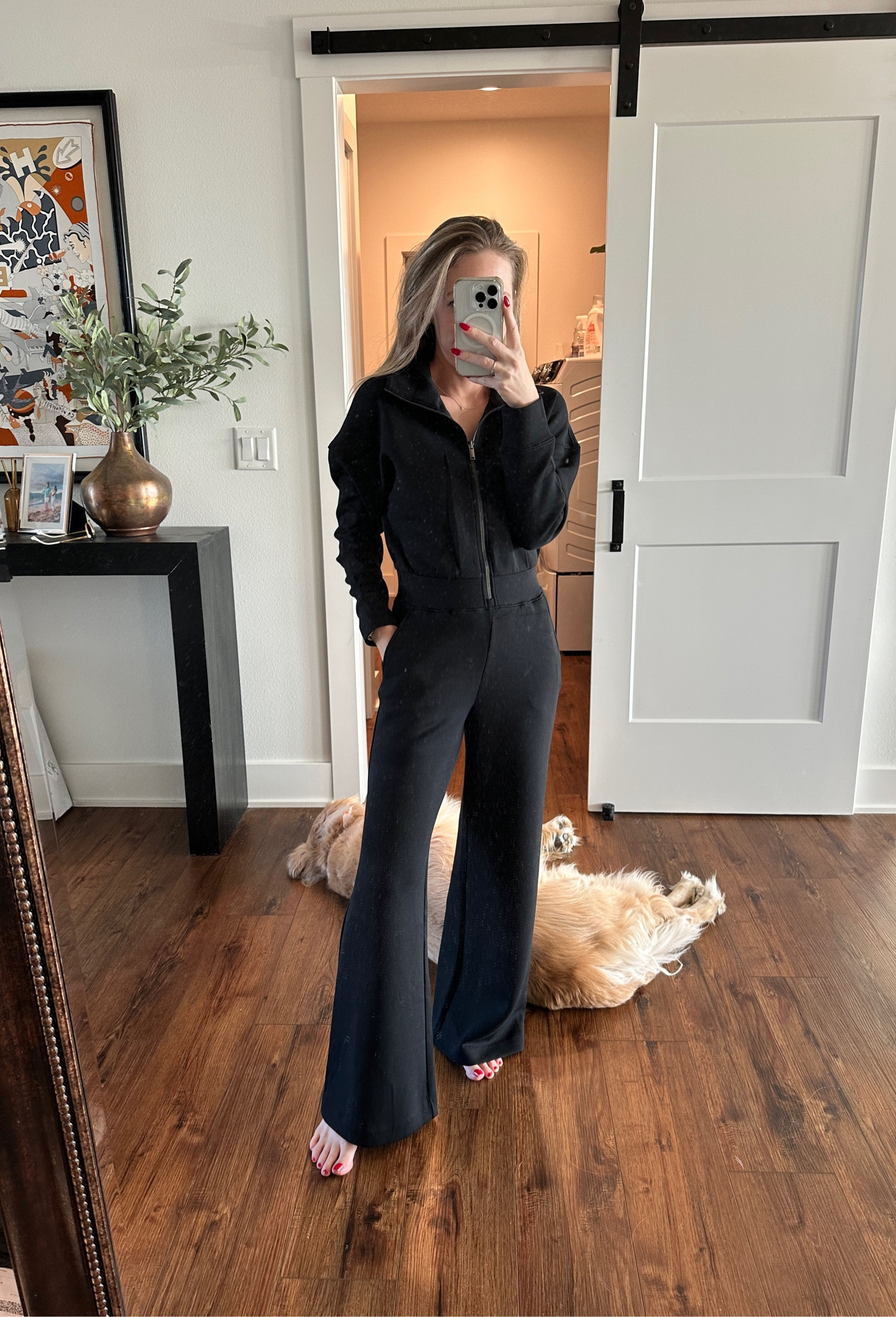 I unfortunately really love this jumpsuit. Expensive, but I had been thinking about it for over a year and wish I would have pulled the trigger sooner! Material is so soft - almost bouncy? Runs TTS - I’m 5’2” in a Petite XS. You will not regret owning this  

#LTKHoliday #LTKGiftGuide #LTKStyleTip