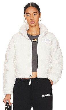 The North Face High Pile Nuptse Jacket in Gardenia White from Revolve.com | Revolve Clothing (Global)
