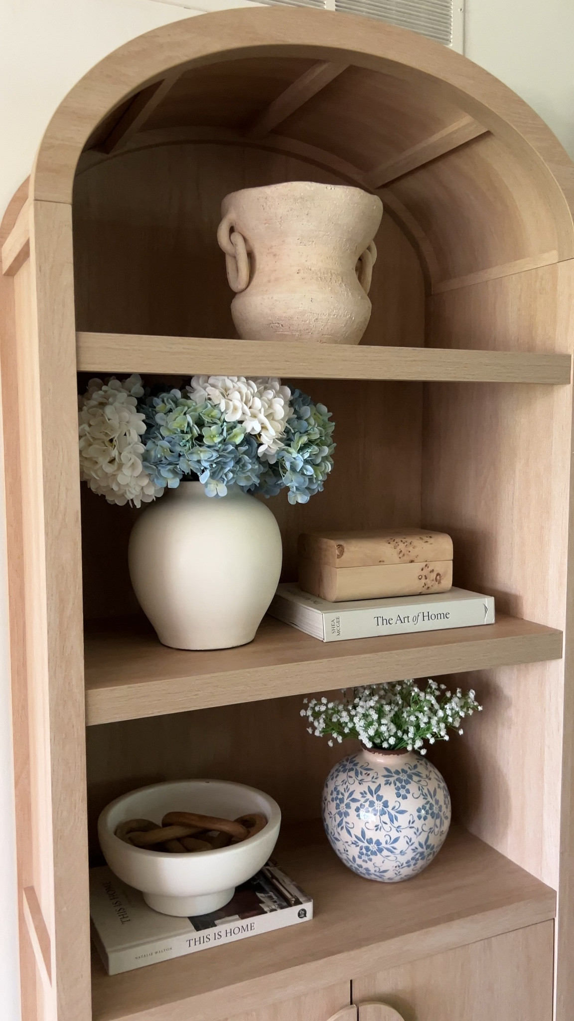 Summer blues in my favorite arched cabinet

#LTKHome #LTKSaleAlert
