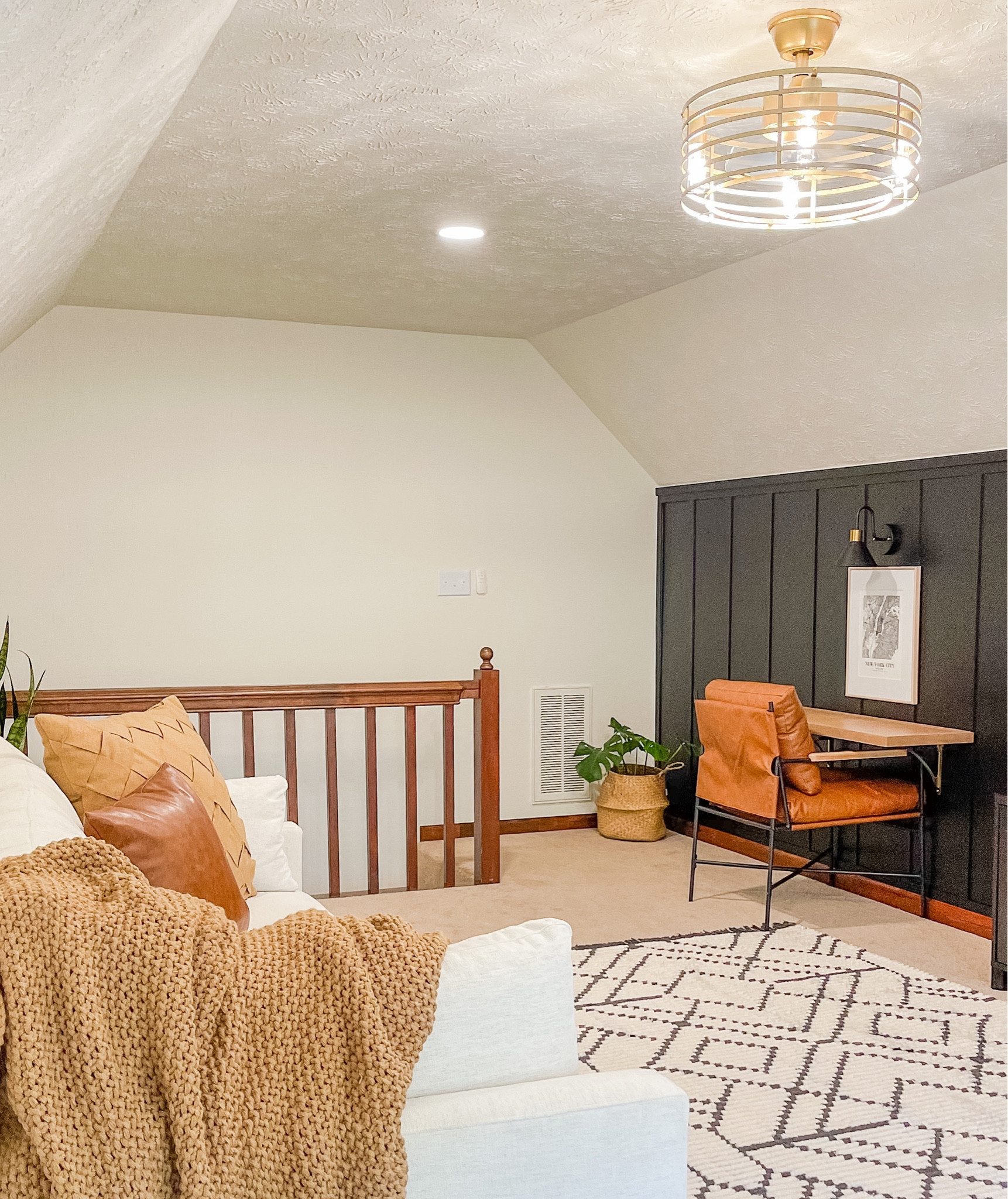 Bonus Room Decor. Rug, Fandalier, leather chair, throw blanket, wall sconce, tv console, picture frames. 

#LTKsalealert #LTKfamily #LTKhome