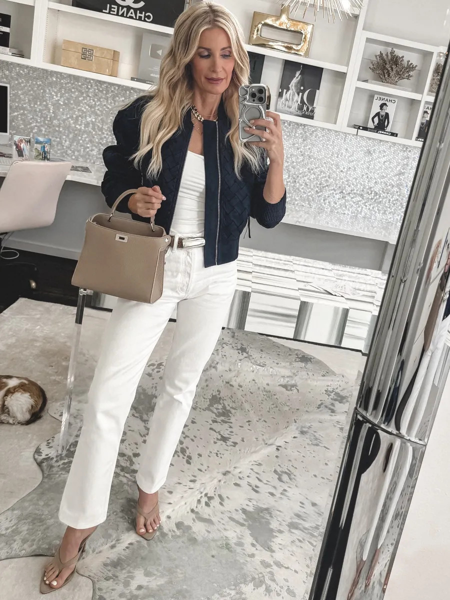 Love this navy bomber jacket paired with an all white outfit for a classic spring and summer outfit formula—navy and white always looks timeless and chic 🤍 I’m wearing an XS in the jacket and size 24 jeans, both fit TTS. 

 

#LTKootd #LTKootd #LTKSeasonal #LTKOver40