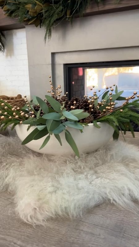 Easy Holiday centerpiece!  I used 3 different stems and some pine cones to create this beautiful centerpiece.  There are 3 of each of the greenery stems and 5 gold berry stems in this arrangement.  This is the large size bowl from Pottery Barn and I also linked an Amazon look for less if you don’t want such a large bowl.  The Norfolk pine stems are from Afloral and I linked a link for less version that is only $5 per stem! 🙌


Christmas home decor, greenery, holiday table, 


#LTKfindsunder50 #LTKstyletip #LTKHoliday