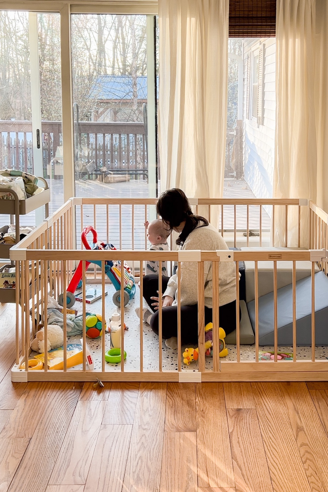 Wood playpen and favorite toys for our 9 month old!