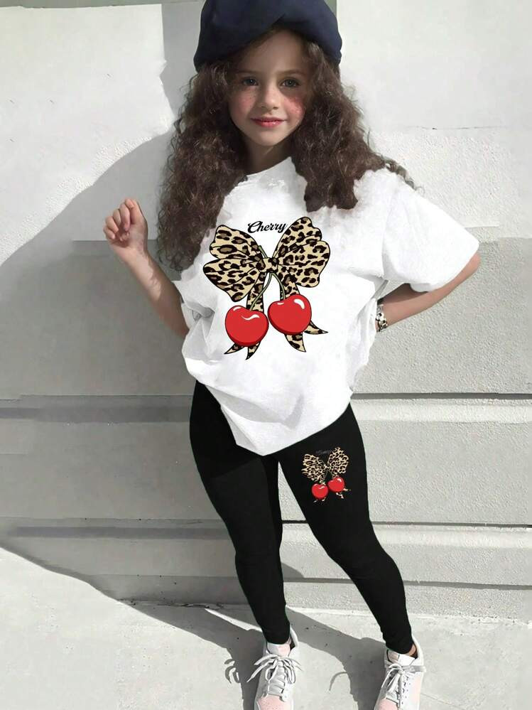 SHEIN Sparklyn Teen Girls'' Fashionable Leopard Print, Cherry & Letter Graphic Round Neck Short Sleeve T-Shirt And Leggings 2pcs Set, Stylish & Casual Butterfly Clothes Kids Butterfly Shirt Outfit For Girls Teen Girls Sets Girls Butterfly Clothes Tween Girl Cherry Shirt Girls Cherry Graphic Tee Leopard Bow Shirt Cherry Print Shirt Girls Casual Shirt Fall Winter | SHEIN