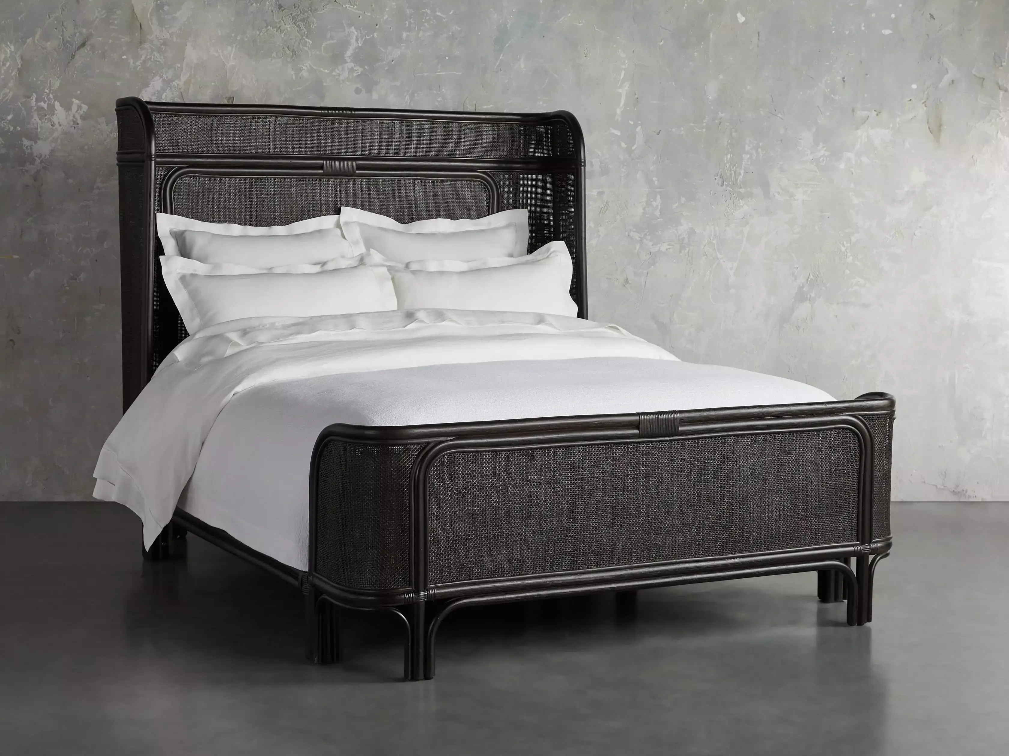 Arhaus store rattan bed