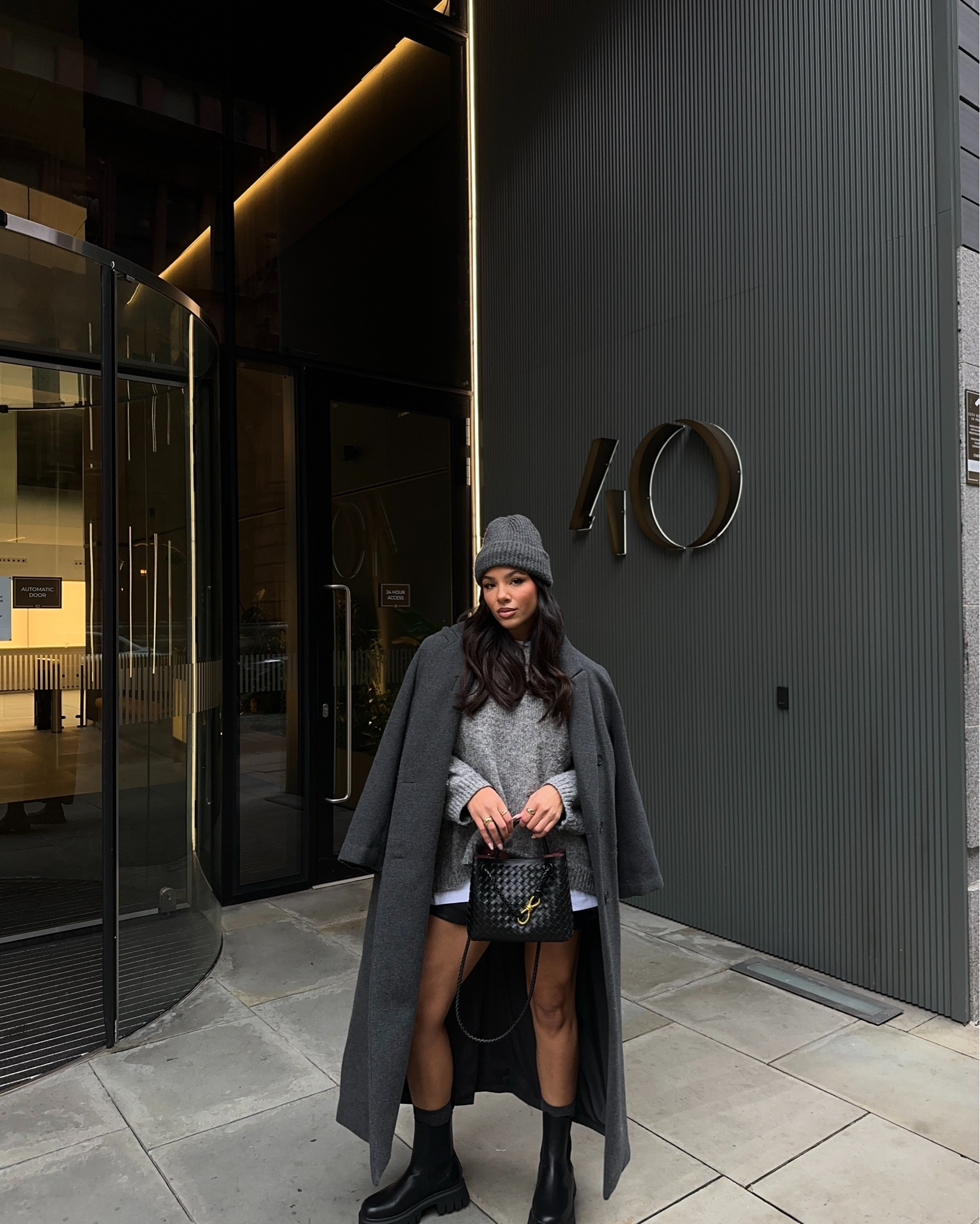 🏷️ grey toned outfit, long grey coat, faux leather shorts, leather mini shorts, oversized grey jumper, workwear, grey beanie, beanie hat 

#LTKeurope #LTKuk #LTKFashionMonth