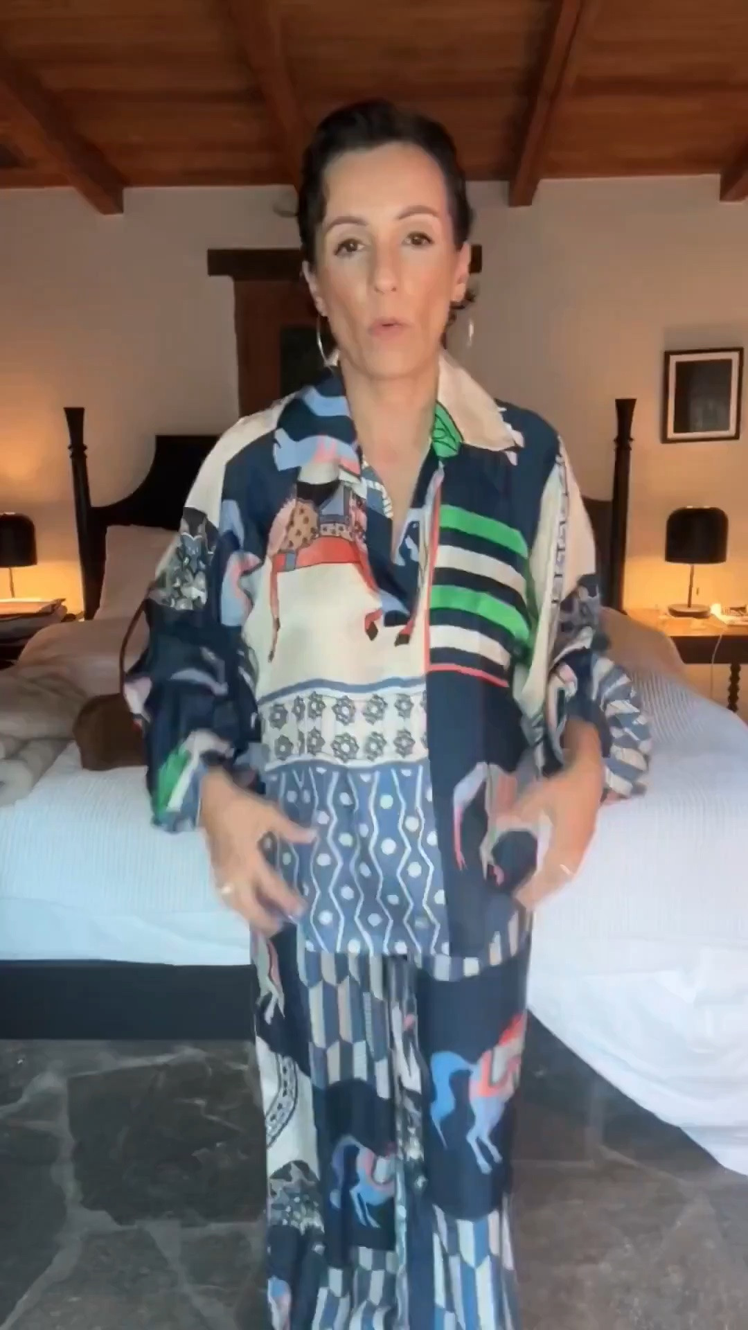 This matching set is such a fun way to wear a statement print! I love the mix of colors and patterns, and the relaxed fit makes it comfortable without losing that polished feel. Wear the pieces together for a complete look or pair the blouse with denim and the pants with a simple knit. I’m wearing an XS in both pieces, and I love how many styling options you get from one set.

printed matching set, two piece outfit, colorful matching set, statement outfit, wide leg pants, printed blouse, fall outfit ideas, women over 50 style, elevated casual style, versatile wardrobe, travel outfit, stylewitheugenia