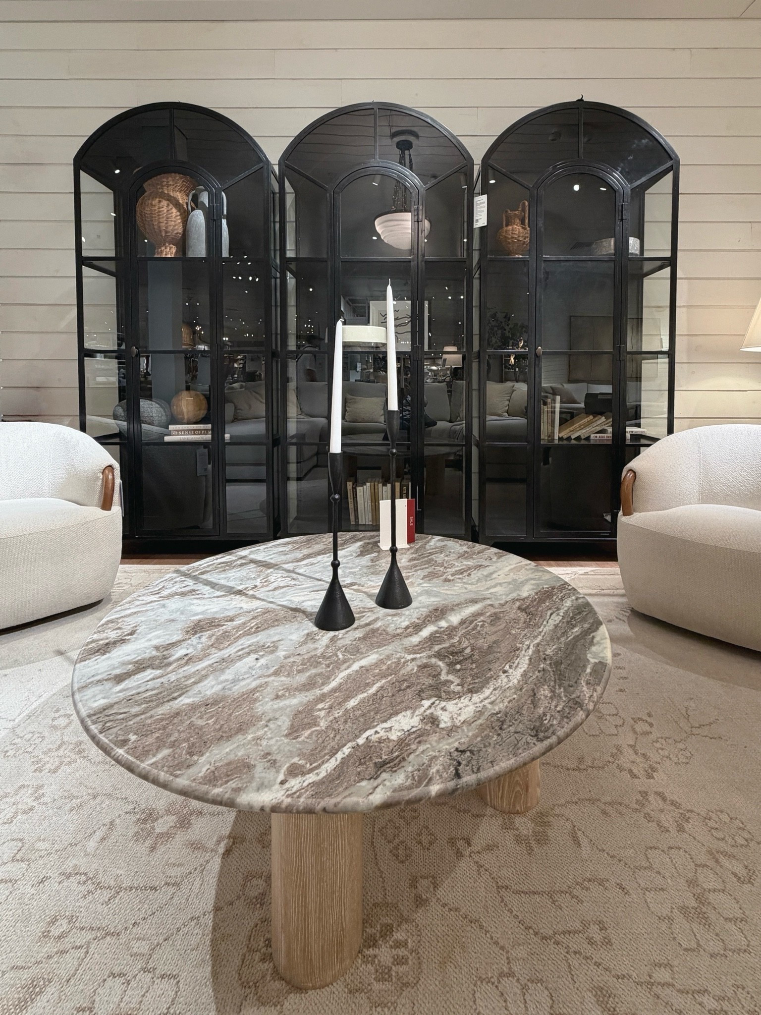 Statement storage inspiration! 🖤 The Ventana Black Metal & Glass Display Cabinet from Crate & Barrel is stunning on its own, but styling three together creates an incredible custom built-in look. 👀 The black metal frame and glass doors add contrast, display space, and so much visual impact! 🙌🏻 A beautiful way to showcase books, decor, dishes, or collected treasures. 📚 Linked this cabinet and similar black storage cabinets here! 🖤 @Crate & Barrel #homeinspo #displaycabinet #storagecabinet

#LTKHome #LTKSaleAlert