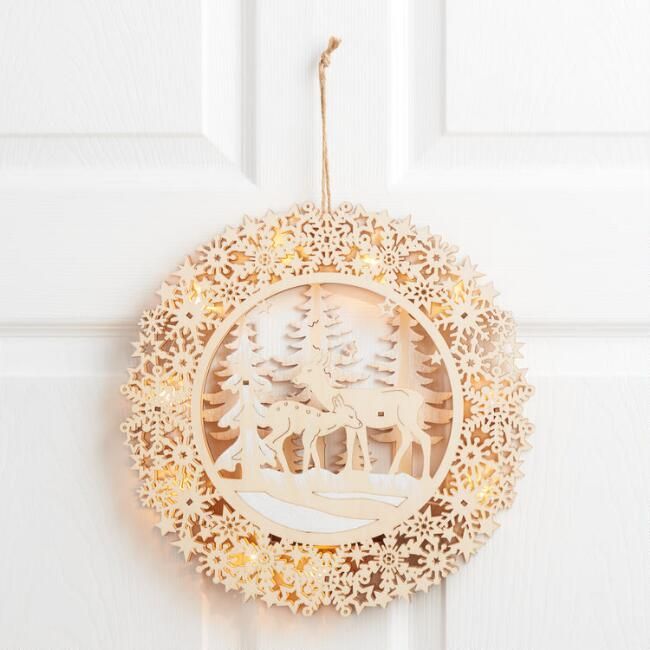 Round Woodcut Winter Scene LED Light Up Hanging Decor | World Market