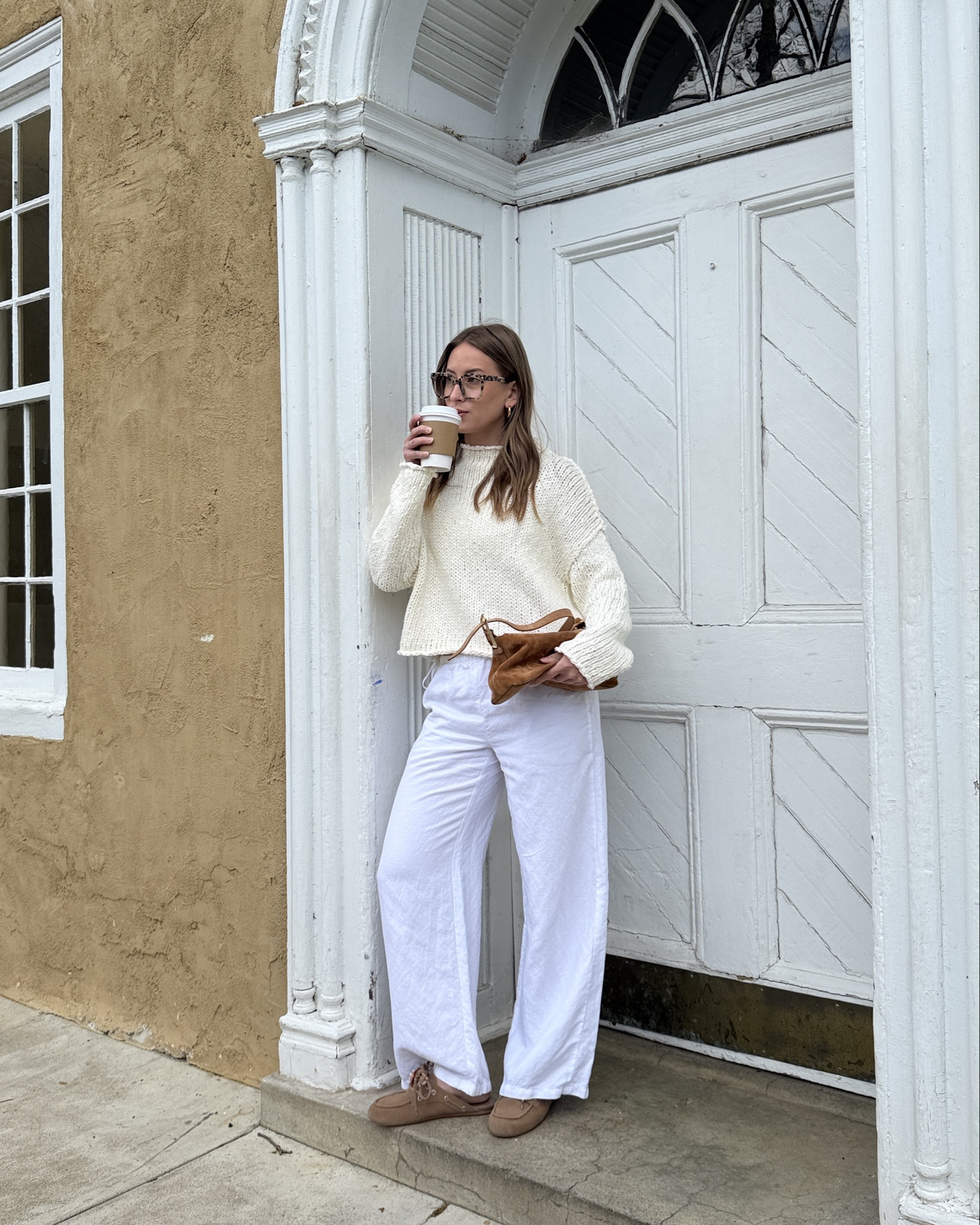 4/22/26 Chilly Spring to Summer Outfit One of those in-between outfits for a chillier spring day 🤍 Aritzia linen pants (wearing a small) with a cozy Free People knit (wearing a medium), paired with my boat shoe slides from Anthropologie. Finished with my J.Crew suede bag and blue light glasses—everything is linked here ✨ 



#LTKootd #LTKSeasonal