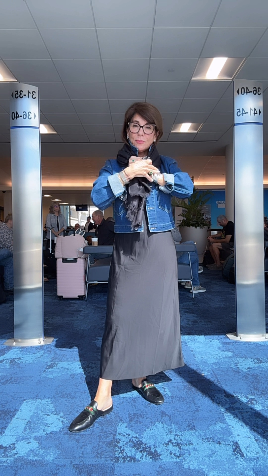 Sharing my favorite fall fine. This black silk spaghetti strap dress will be on repeat. I’m taking it on a trip with me today. I’m pairing it with a white T-shirt and a denim jacket and some black slides and a scarf to keep me cozy on the flight there the dress fits true to size. It’s especially special for all petite women. You’re gonna love it.. I’m wearing an xs 

#LTKTravel #LTKWorkwear #LTKFallSale