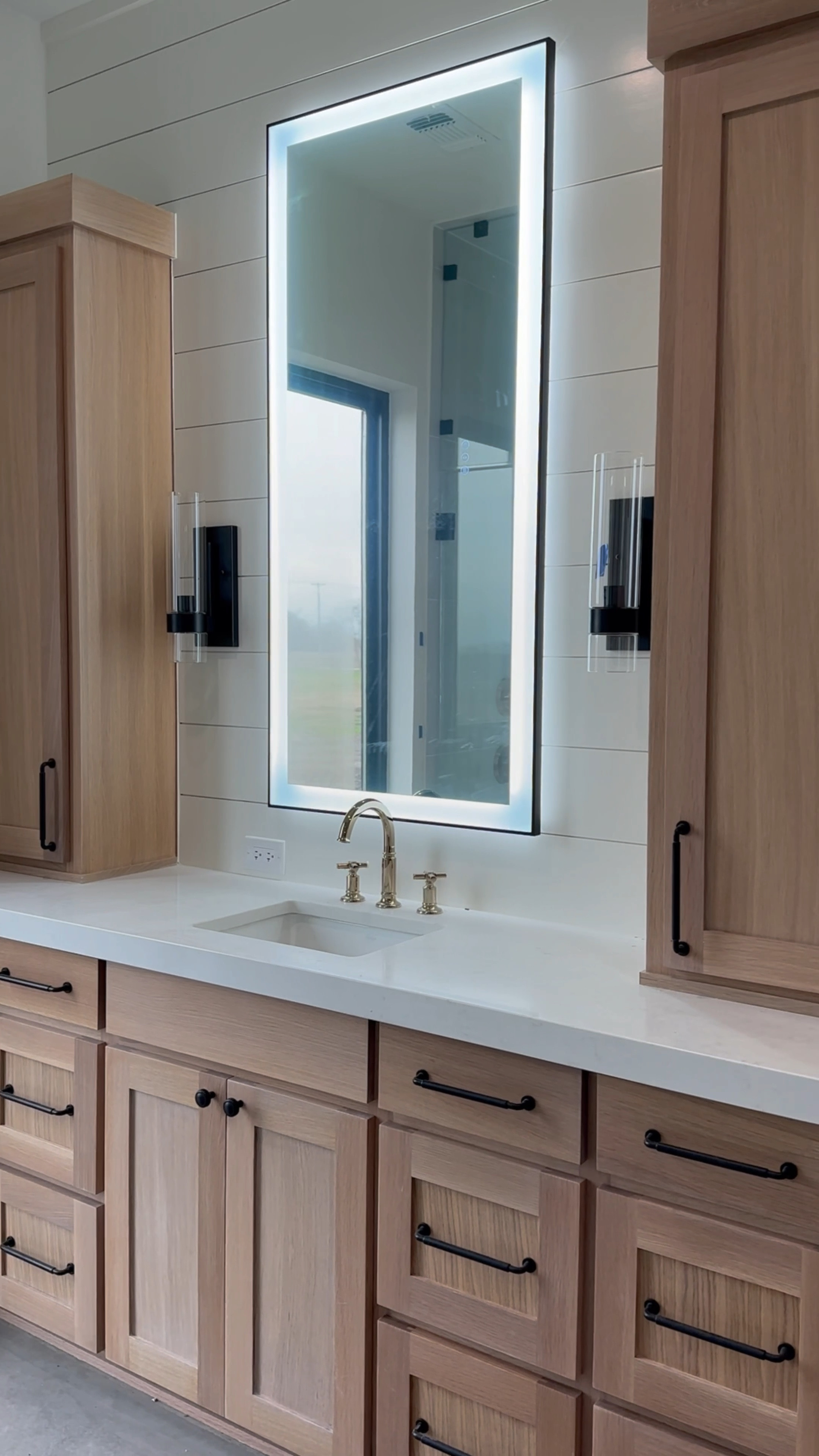 These mirrors were such a great find on AMAZON! They came packaged perfectly and have 3 lighting temperatures, an anti fog feature and they are backlit! They can hang vertically or horizontally  We opted to hardwire these in with a switch but they also have an option to plug directly into the wall. Love how they look in our space! 

#LTKfamily #LTKhome #LTKVideo