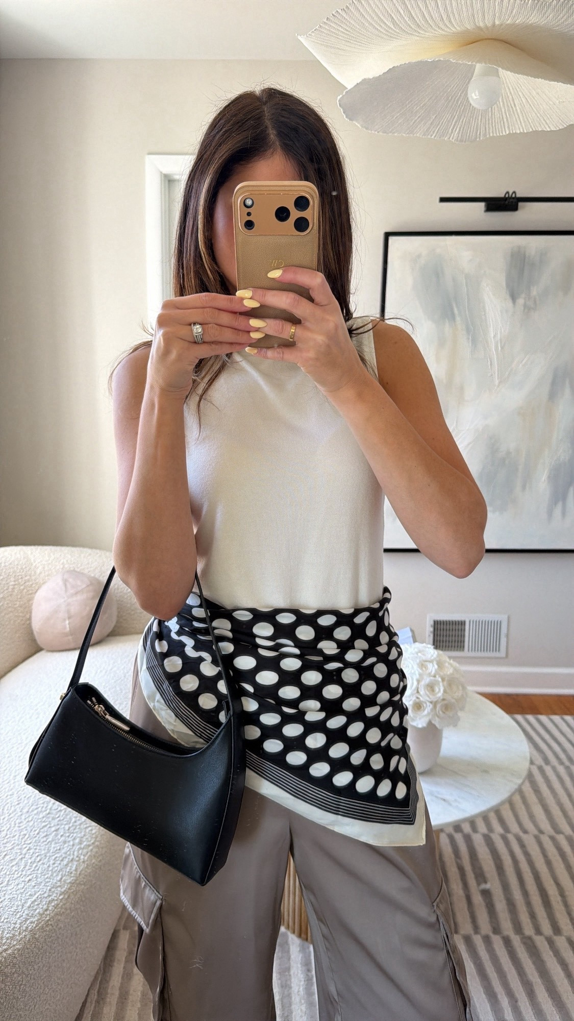 My top and silk pants are on sale. They both run through to size I went with a size small in the bottoms. my scarf is old from Amazon, so I linked a black-and-white striped one that is similar. Black purse, work outfit, casual, Parisian style.

#LTKOver40 #LTKSaleAlert #LTKootd