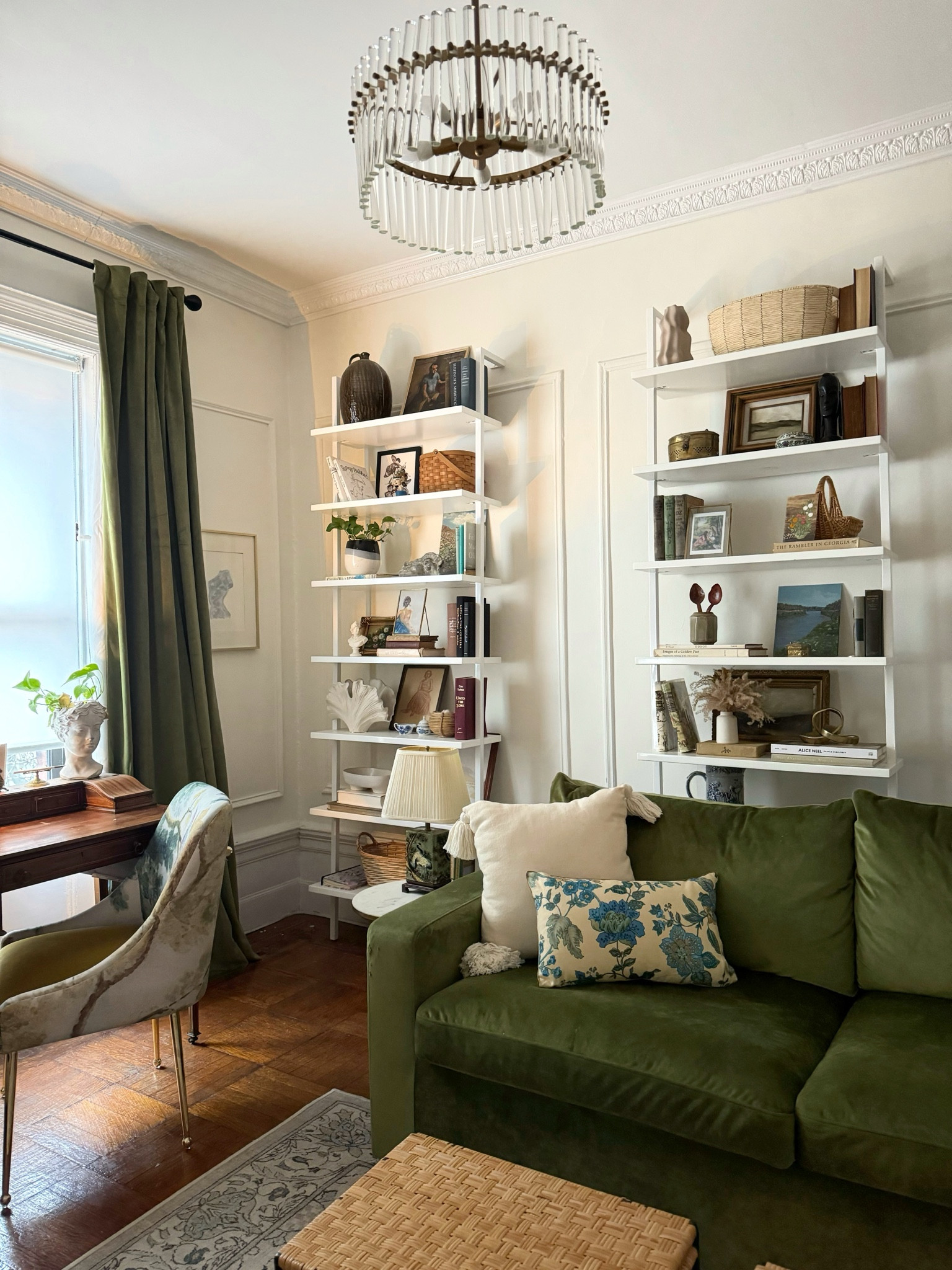 White bookshelf, green velvet curtains, floral throw pillow, upholstered desk chair, antique writing desk, crown molding 

#LTKhome #LTKstyletip #LTKMostLoved