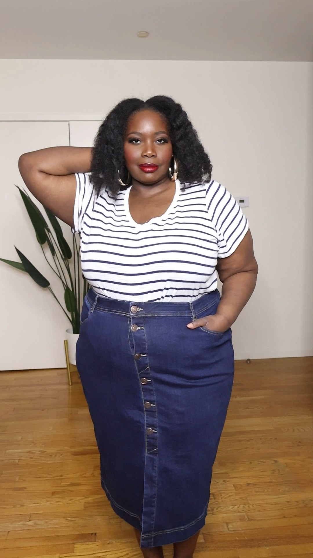 A midi denim skirt is perfect for a cute spring outfit. I like the button front details on this stretch mid skirt from @Avenue #gifted 

#LTKPlusSize #LTKOver40 #LTKMidsize