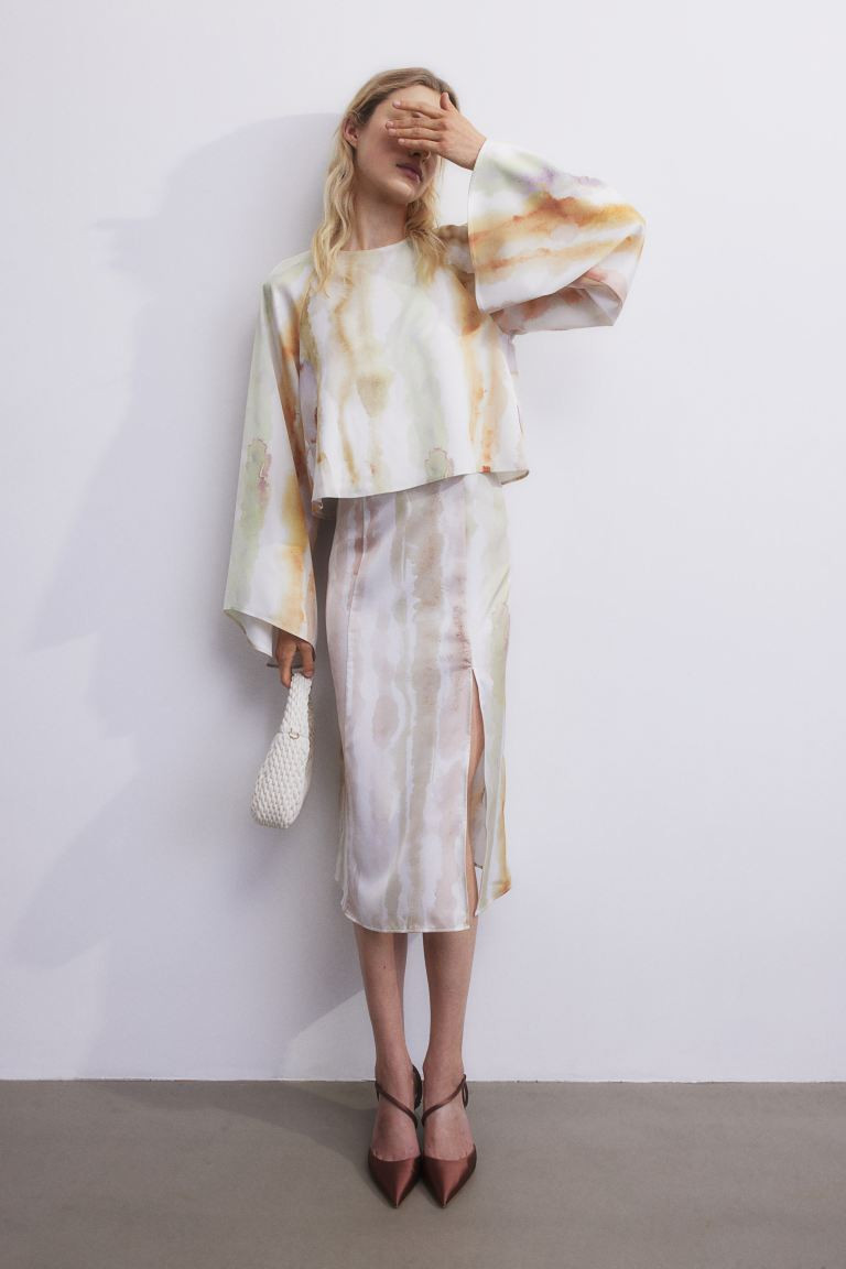 Camicetta con maniche scampanate - Crema/fantasia - DONNA | H&M IT | H&M (FR, IT, ES, PT, BE)